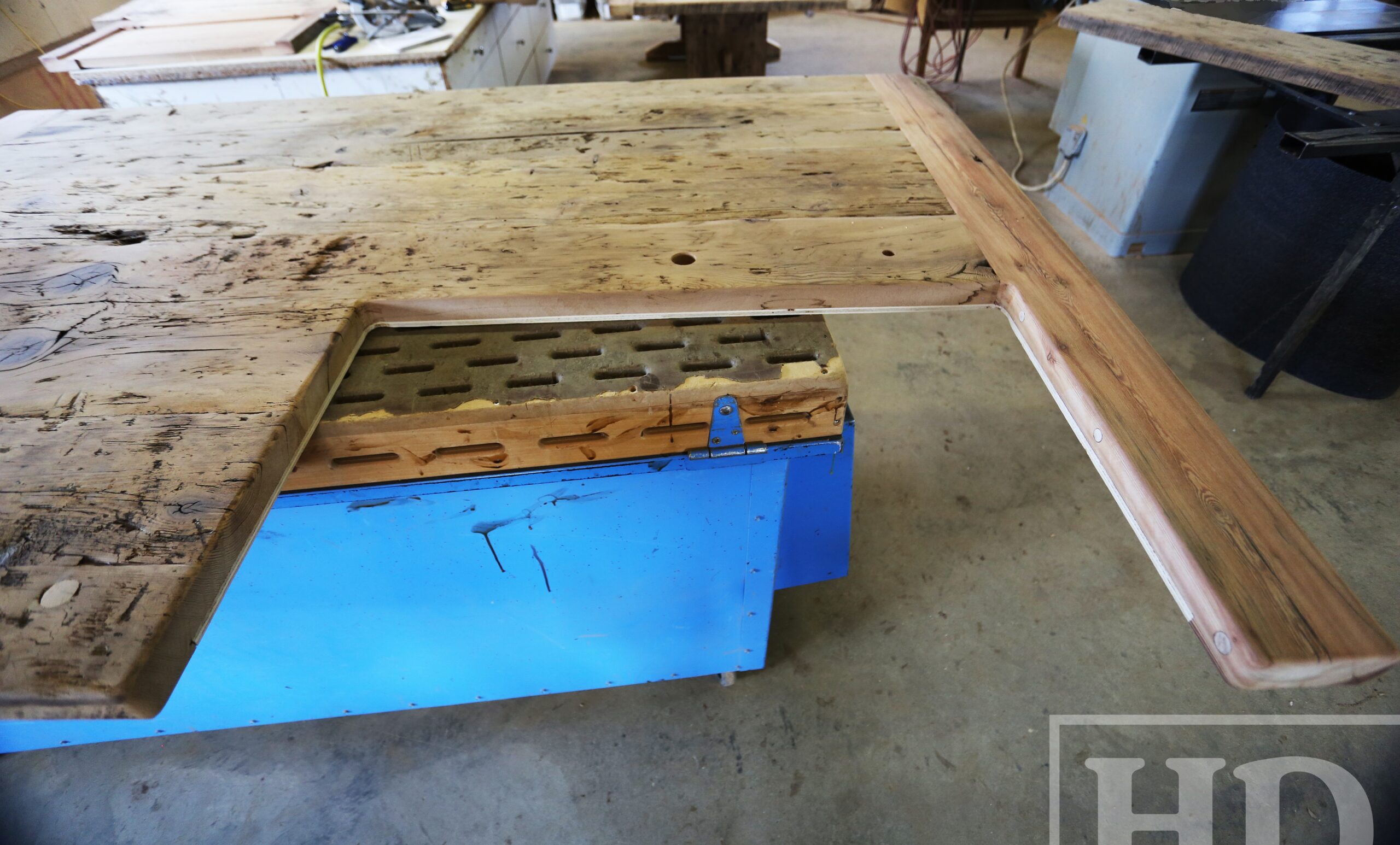 Custom Reclaimed Wood Island Top we made for a Wasaga Beach, Ontario Home - 2" Hemlock Threshing Floor Construction - Original Ontario barnwood edges & distressing maintained - Premium epoxy + satin polyurethane finish - www.table.ca