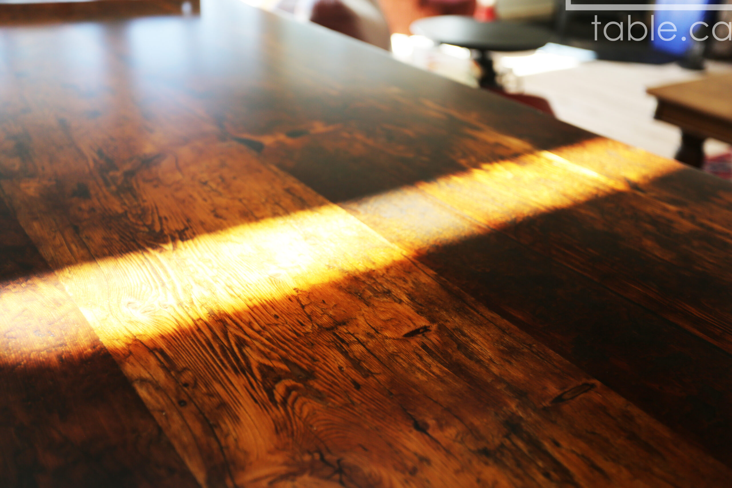 Custom Reclaimed Wood Island Top we made for a Wasaga Beach, Ontario Home - 2" Hemlock Threshing Floor Construction - Original Ontario barnwood edges & distressing maintained - Premium epoxy + satin polyurethane finish - www.table.ca