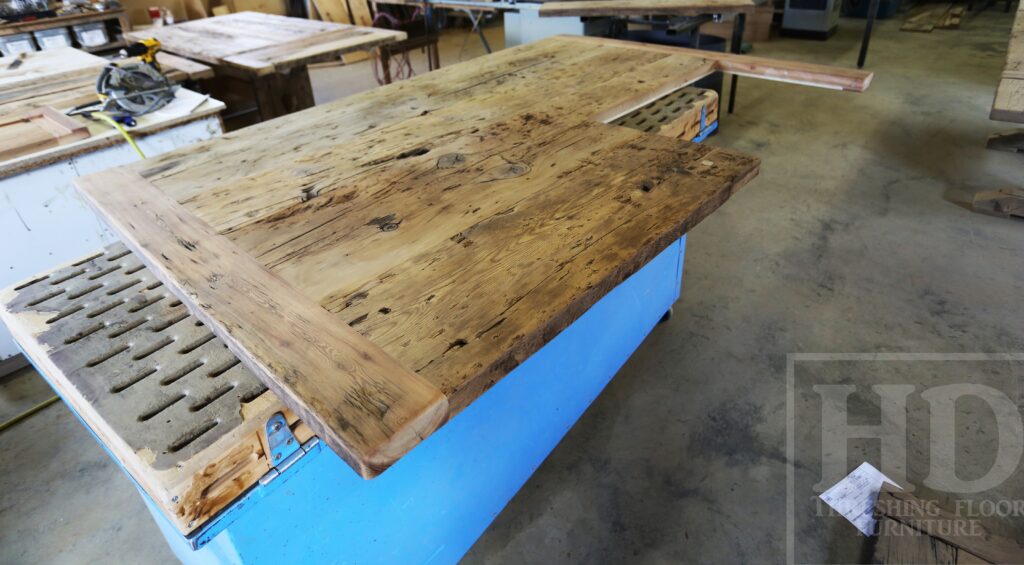 Custom Reclaimed Wood Island Top we made for a Wasaga Beach, Ontario Home - 2" Hemlock Threshing Floor Construction - Original Ontario barnwood edges & distressing maintained - Premium epoxy + satin polyurethane finish - www.table.ca