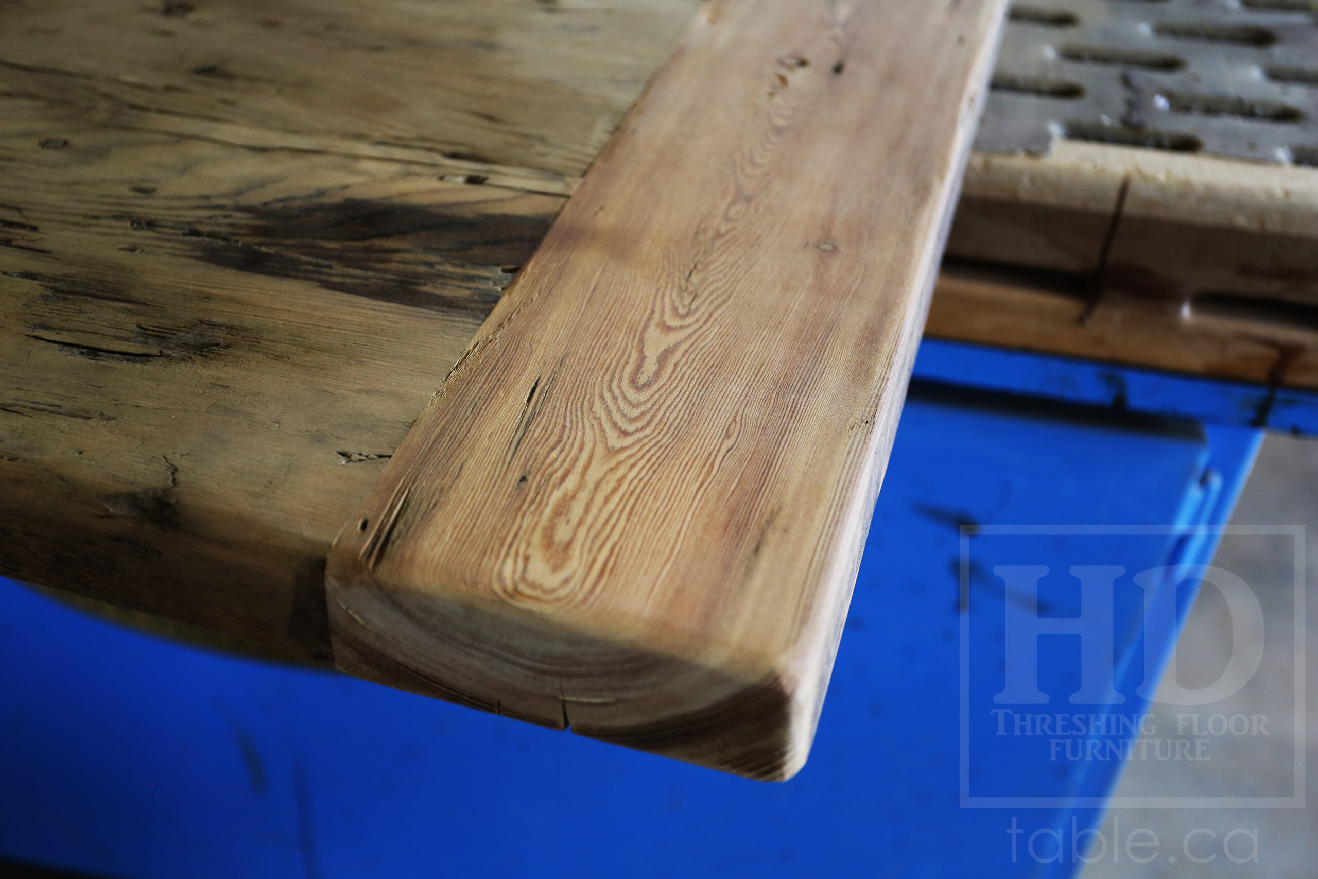 Custom Reclaimed Wood Island Top we made for a Wasaga Beach, Ontario Home - 2" Hemlock Threshing Floor Construction - Original Ontario barnwood edges & distressing maintained - Premium epoxy + satin polyurethane finish - www.table.ca