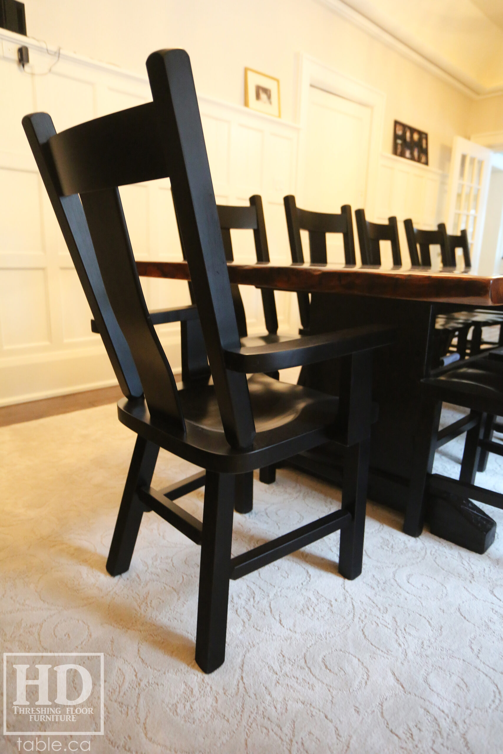 12' Reclaimed Wood Table for a Port Dover home - 42" wide - Trestle Base - 2" Old Growth Pine Threshing Floor Construction - Original edges & distressing maintained - Premium epoxy + satin polyurethane finish - Black Painted Base - 12 Plank Back Chairs / Wormy Maple - Painted Solid Black / Satin polyurethane clearcoat finish - www.table.ca