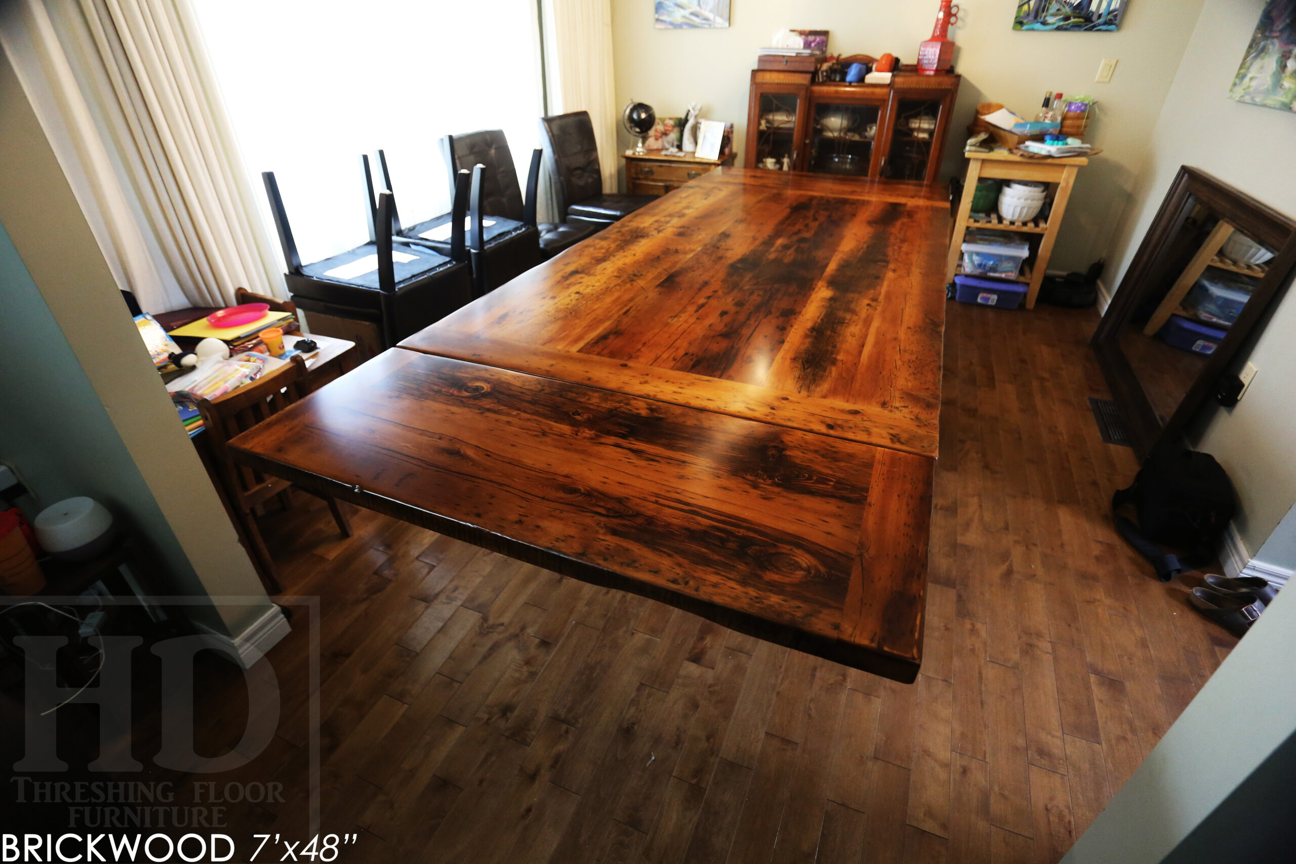 7' Ontario barnwood trestle table we made for an Ingersoll, ON company - 48" wide - 2" Hemlock Threshing Floor Construction - Original edges & distressing maintained - Premium epoxy + satin polyurethane finish - Two 18" leaf extensions [making total length 10' when extended] - www.table.ca