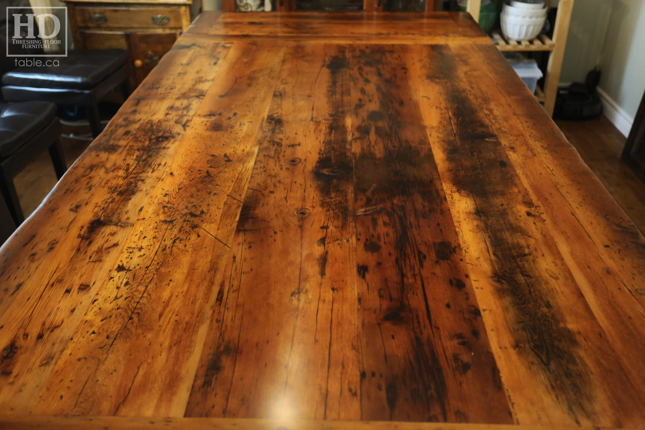 7' Ontario barnwood trestle table we made for an Ingersoll, ON company - 48" wide - 2" Hemlock Threshing Floor Construction - Original edges & distressing maintained - Premium epoxy + satin polyurethane finish - Two 18" leaf extensions [making total length 10' when extended] - www.table.ca