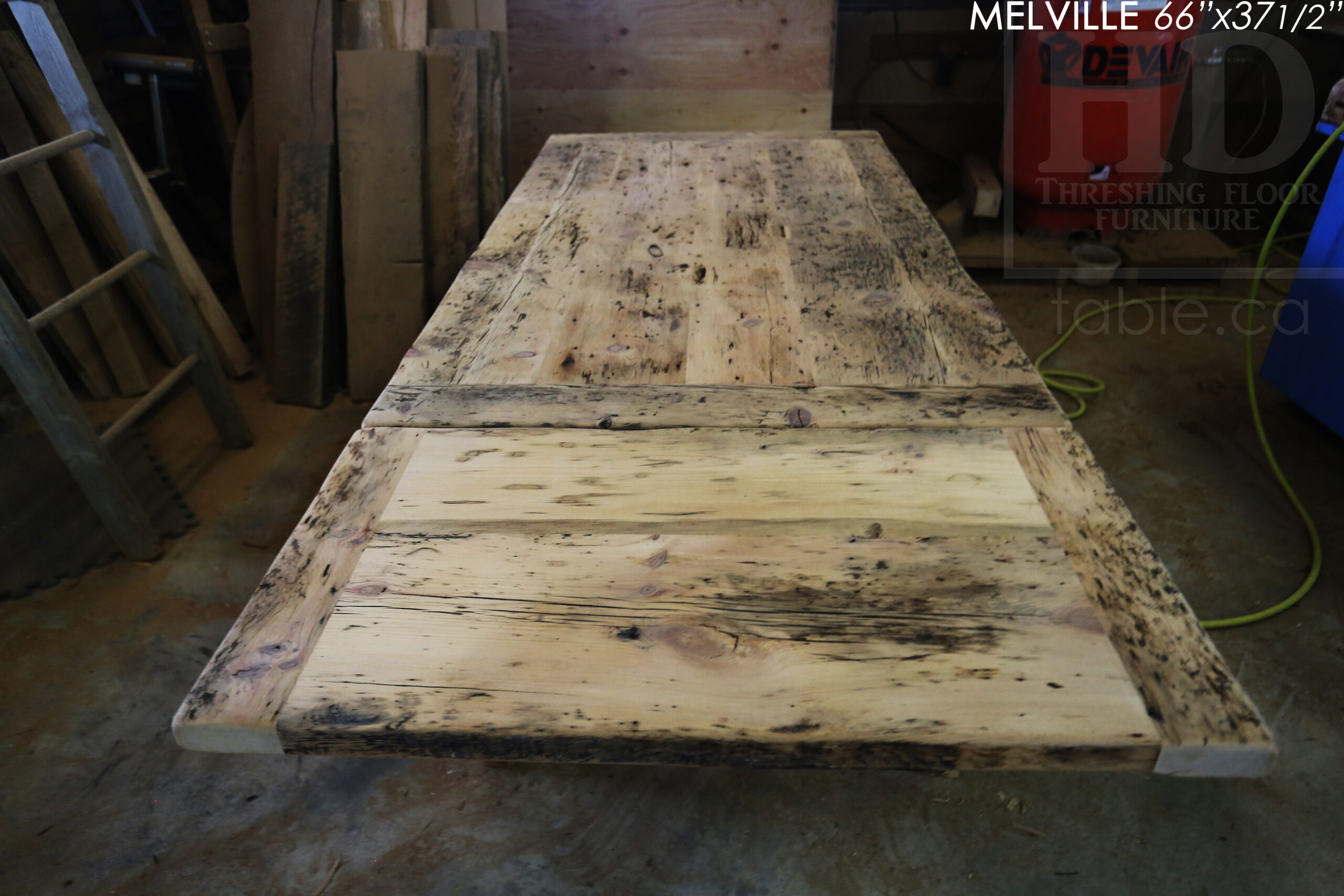 Details: 66" Reclaimed Wood Table we made for a Maple, ON home - 37 1/2" wide - Harvest Base - Tapered with a Notch Windbrace Beam Legs - Old Growth Pine Threshing Floor Construction - Original edges & distressing maintained - Premium epoxy + satin polyurethane finish - One - 20" leaf - www.table.ca