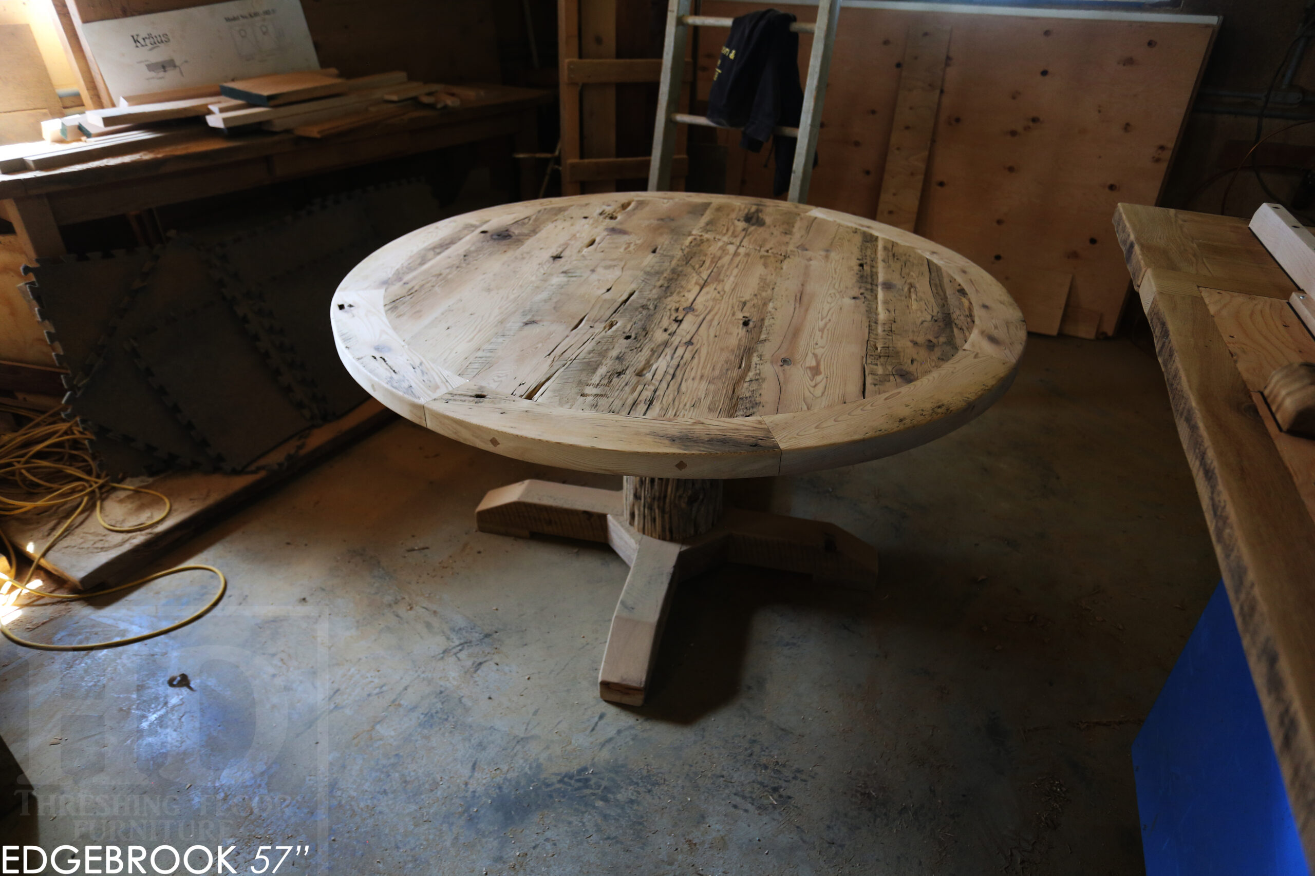 57" Reclaimed Wood Round Table we made for a Waterloo home - Hemlock Threshing Floor 2" Top - Original edges & distressing maintained - Cedar Hydro pole base - Premium epoxy + satin polyurethane finish / www.table.ca