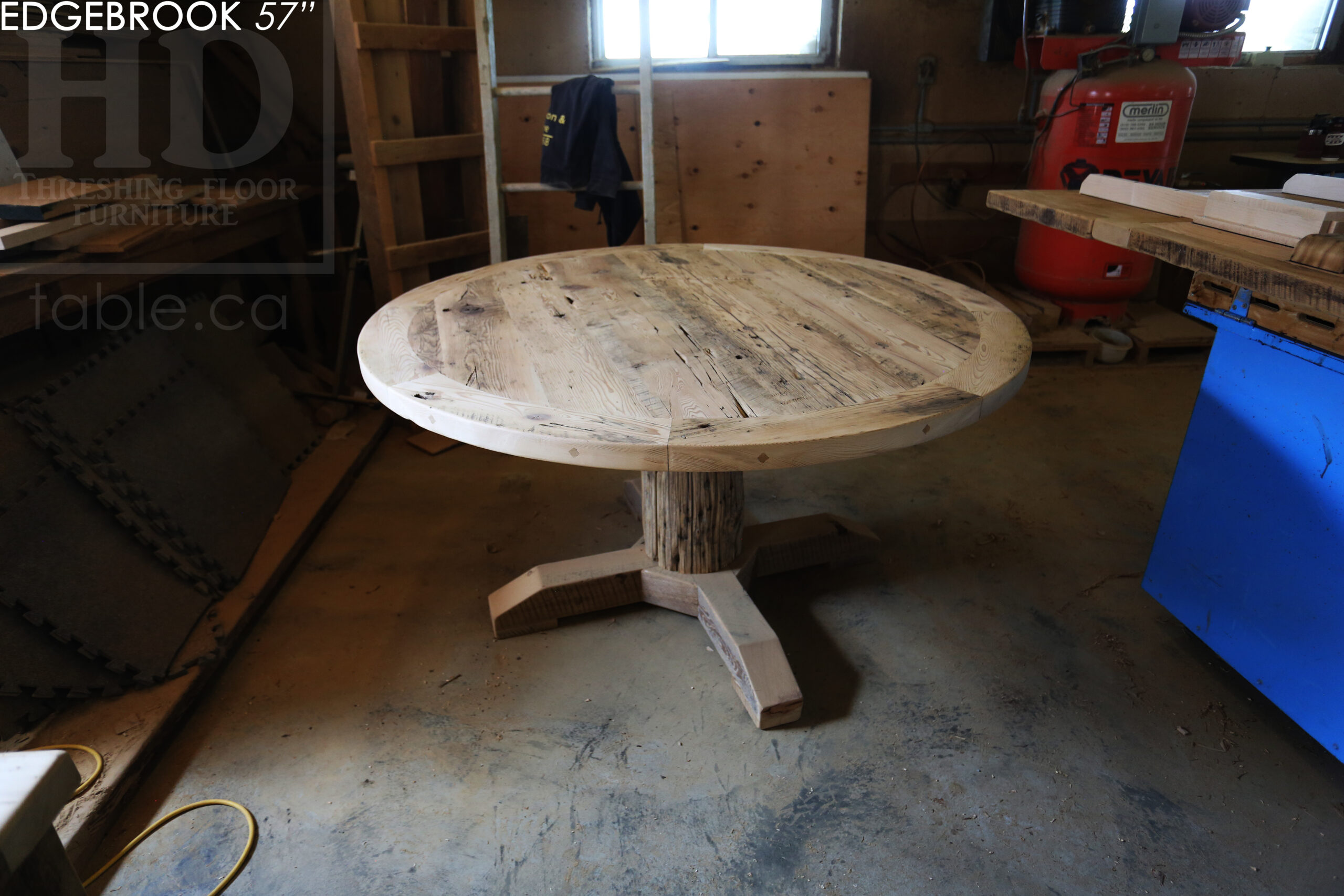 57" Reclaimed Wood Round Table we made for a Waterloo home - Hemlock Threshing Floor 2" Top - Original edges & distressing maintained - Cedar Hydro pole base - Premium epoxy + satin polyurethane finish / www.table.ca