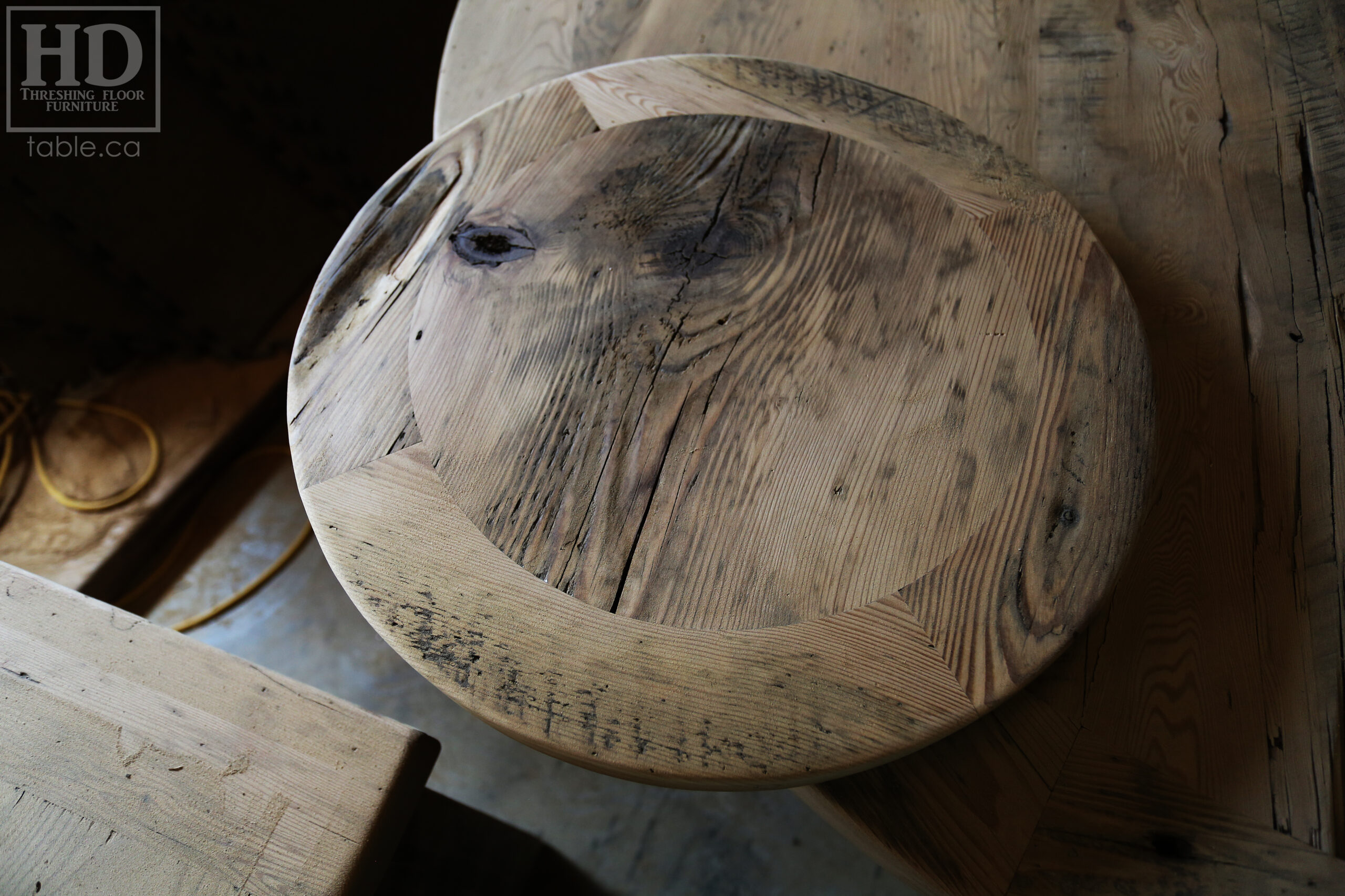 57" Reclaimed Wood Round Table we made for a Waterloo home - Hemlock Threshing Floor 2" Top - Original edges & distressing maintained - Cedar Hydro pole base - Premium epoxy + satin polyurethane finish / www.table.ca