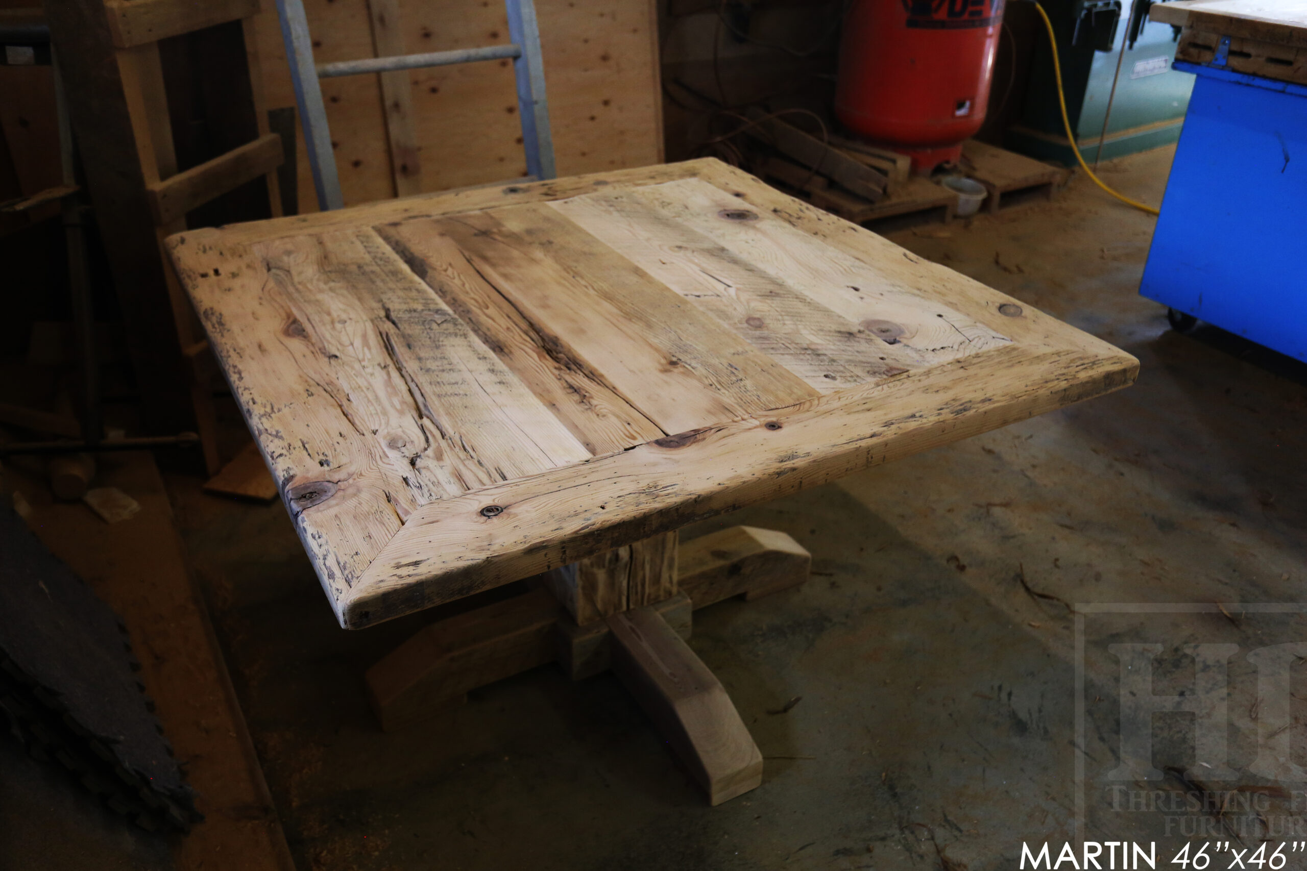 48" x 48" Reclaimed Wood Sqaure Table we made for a Burlington home - 28" height - Mitred Corners - Hand-Hewn Beam Pedestals Base - Original edges & distressing maintained - Hemlock Threshing Floor Construction - Greytone Treatment Option to maintain the light colour of unfinished - www.table.ca