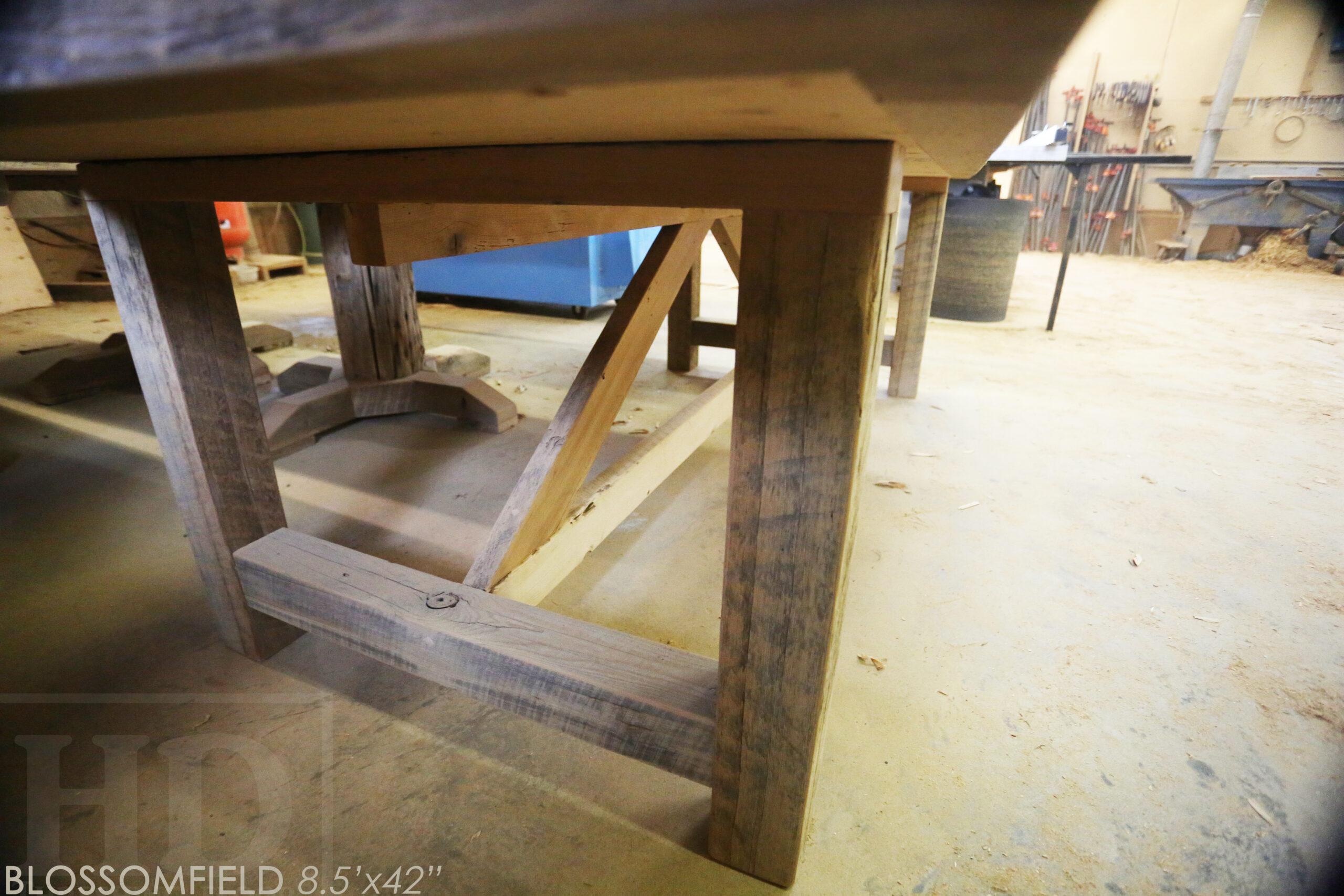 Project details: 8.5' Reclaimed Wood Table we made for a Cambridge, Ontario home - 42" wide - Frame Base - Old Growth Hemlock Threshing Floor Construction - Original edges & distressing maintained - Premium epoxy + matte polyurethane finish - www.table.ca