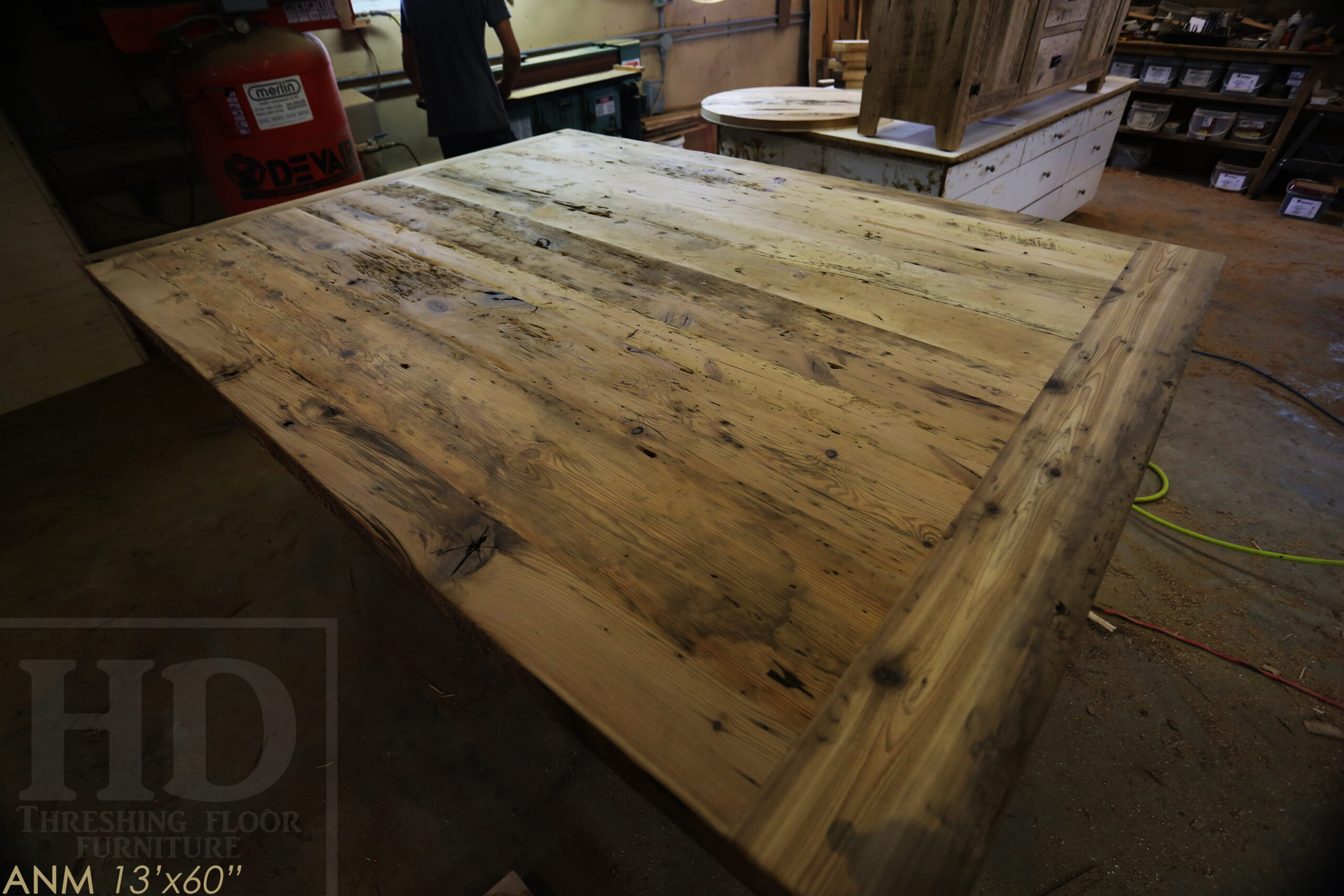 13' Ontario Barnwood Boardroom Table we made for a Toronto company - 60" wide - Matte Black U Shaped Metal Base - 2" Hemlock Threshing Floor Top - Original edges & distressing maintained - Premium epoxy + satin polyurethane finish - www.table.ca