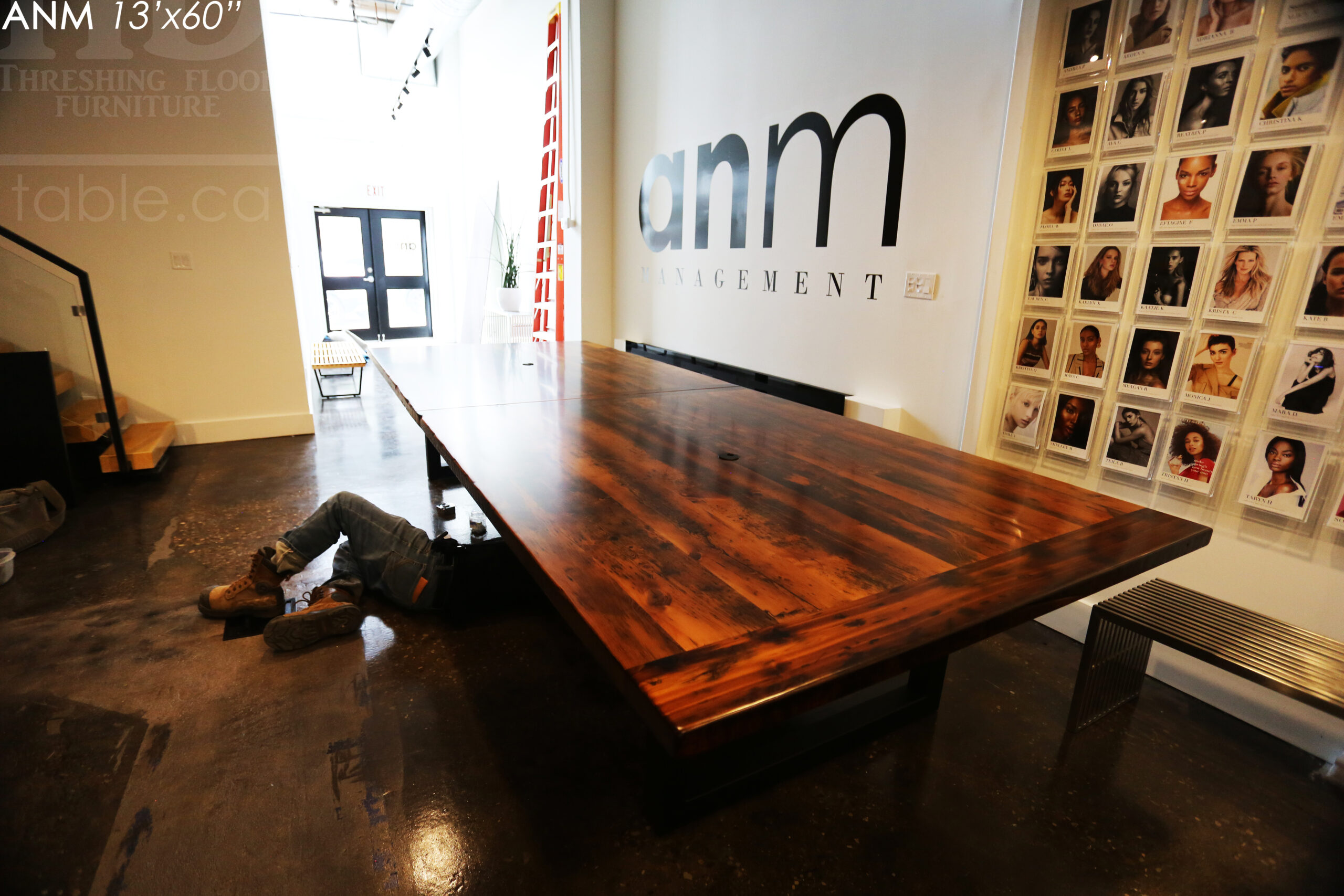 13' Ontario Barnwood Boardroom Table we made for a Toronto company - 60" wide - Matte Black U Shaped Metal Base - 2" Hemlock Threshing Floor Top - Original edges & distressing maintained - Premium epoxy + satin polyurethane finish - www.table.ca