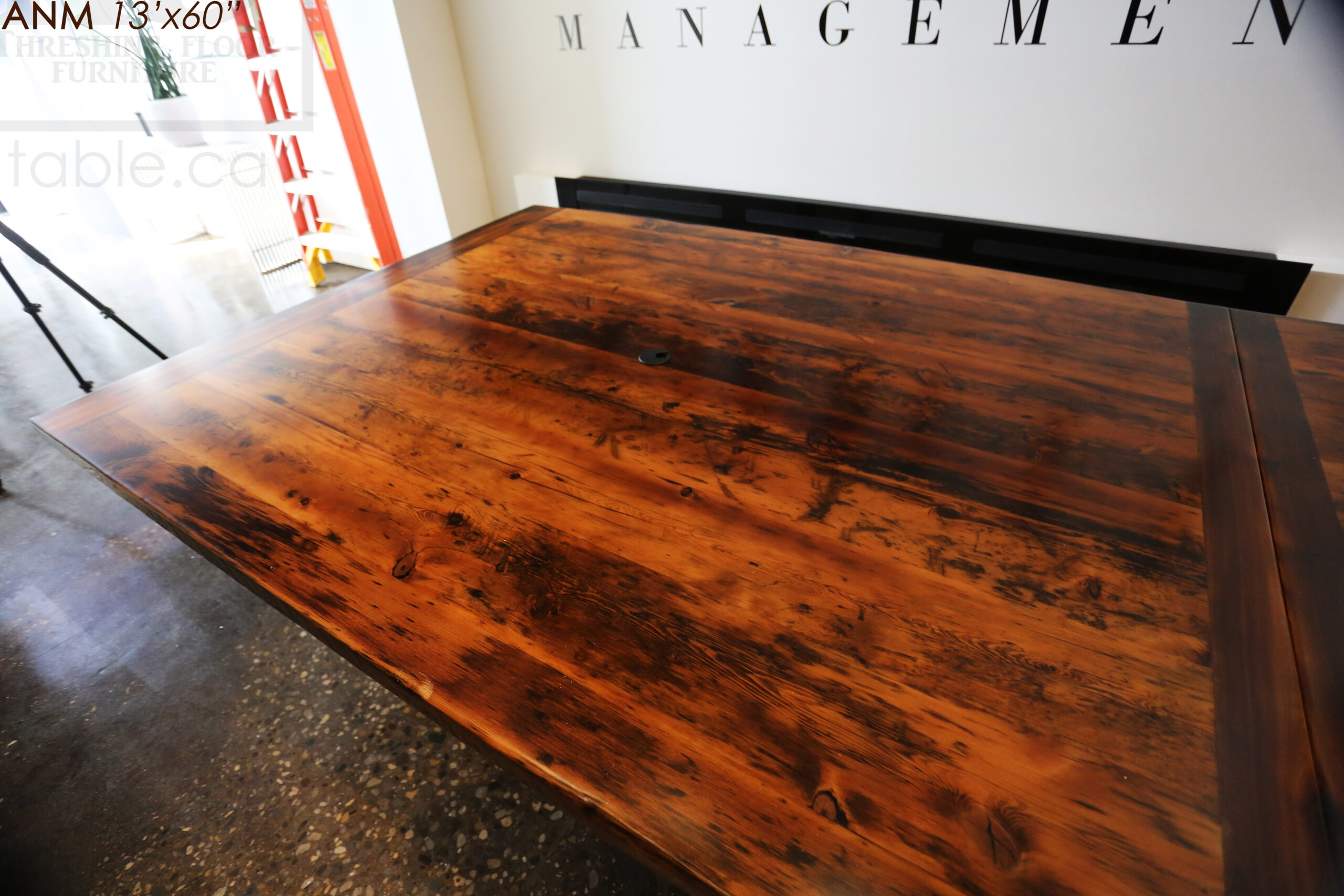 13' Ontario Barnwood Boardroom Table we made for a Toronto company - 60" wide - Matte Black U Shaped Metal Base - 2" Hemlock Threshing Floor Top - Original edges & distressing maintained - Premium epoxy + satin polyurethane finish - www.table.ca