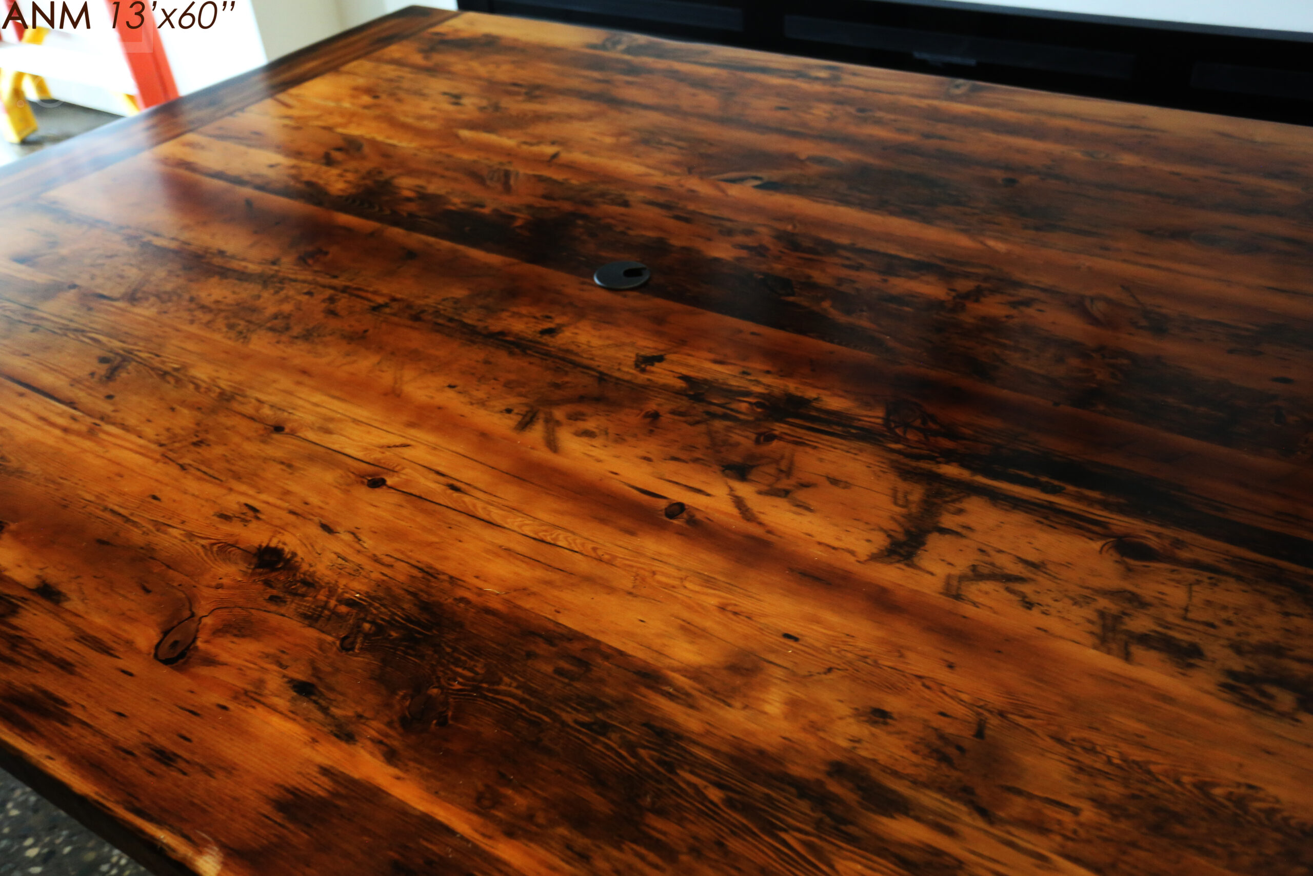 13' Ontario Barnwood Boardroom Table we made for a Toronto company - 60" wide - Matte Black U Shaped Metal Base - 2" Hemlock Threshing Floor Top - Original edges & distressing maintained - Premium epoxy + satin polyurethane finish - www.table.ca