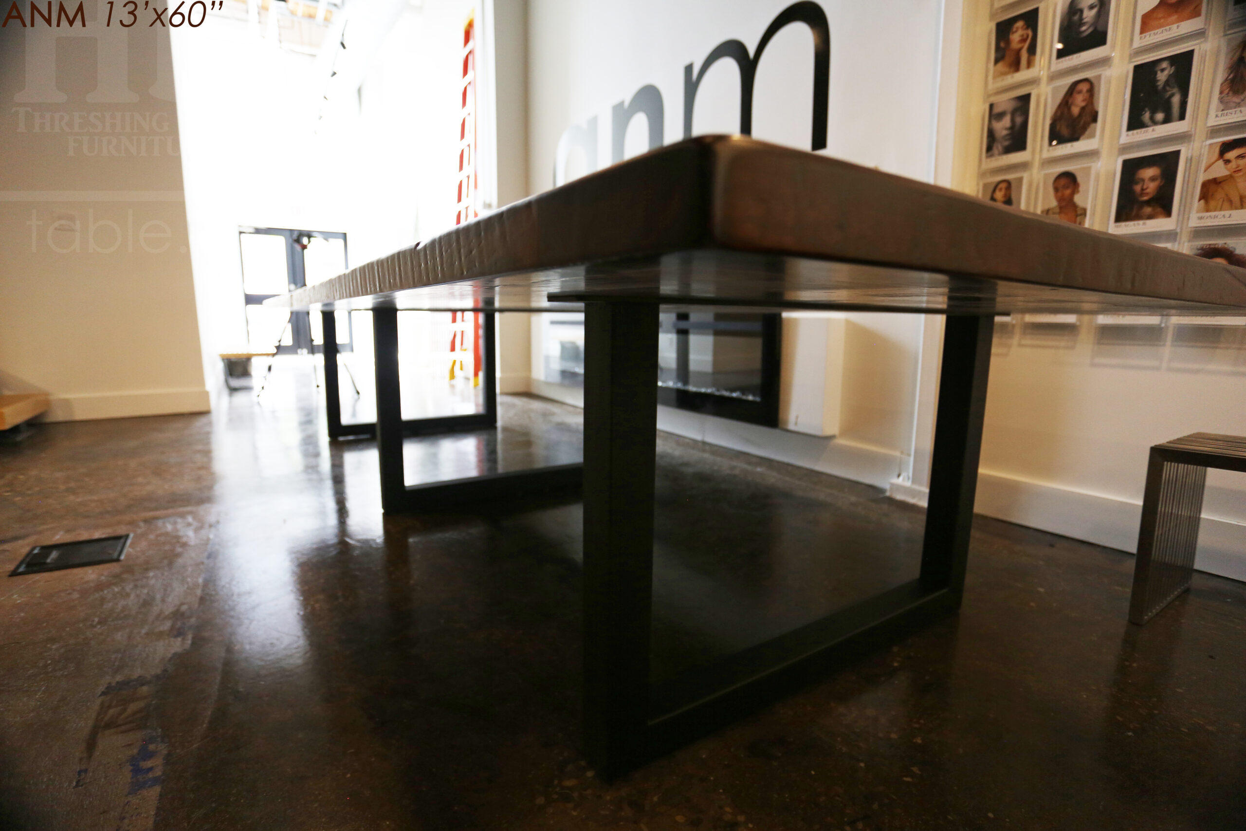 13' Ontario Barnwood Boardroom Table we made for a Toronto company - 60" wide - Matte Black U Shaped Metal Base - 2" Hemlock Threshing Floor Top - Original edges & distressing maintained - Premium epoxy + satin polyurethane finish - www.table.ca