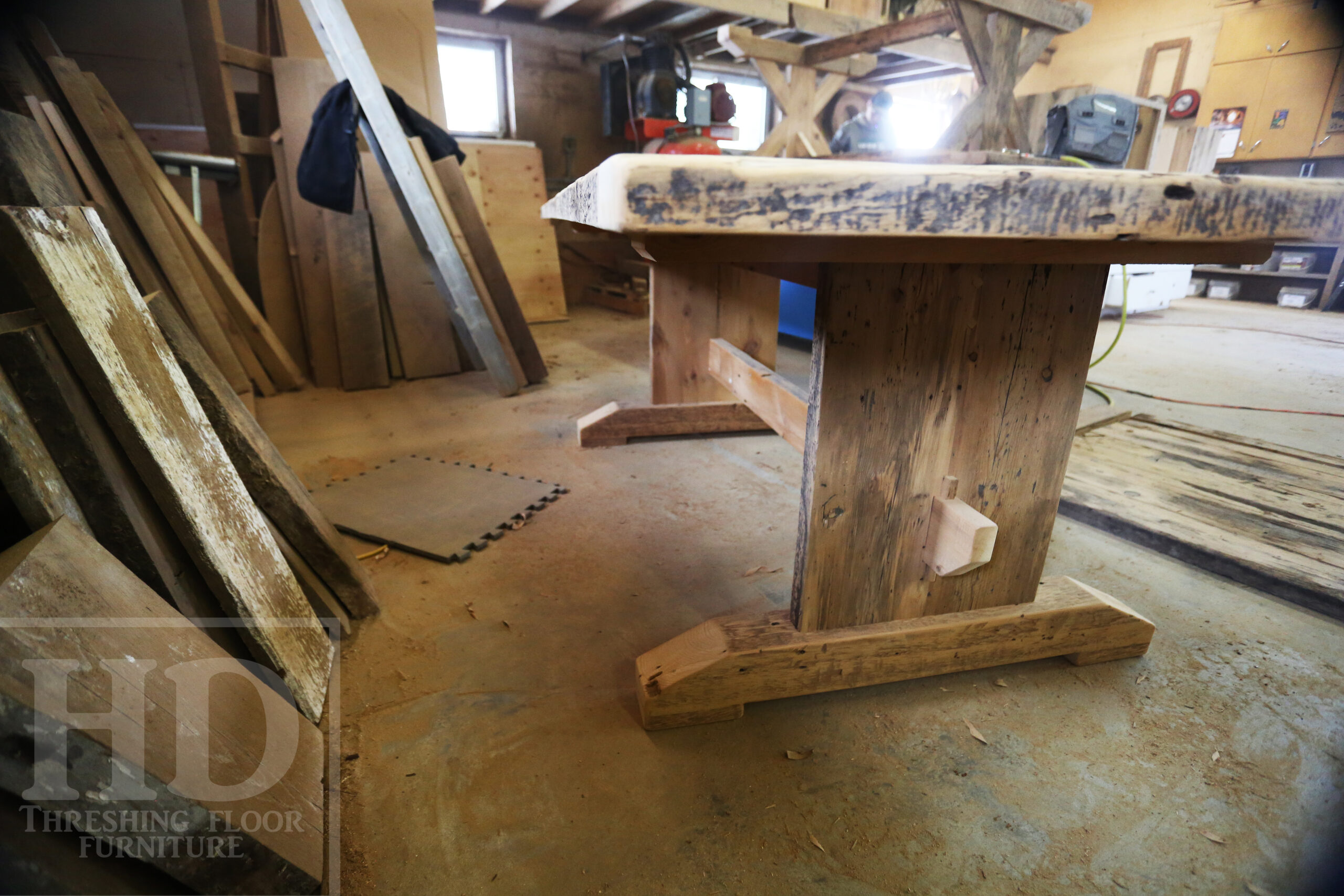 7' Ontario Barnwood Table for a Grassie, Ontario Home - 42" wide - Trestle Base - Reclaimed Old Growth Pine Threshing Floor Construction - Original Distressing & Character & Edges Maintained - Premium epoxy + satin polyurethane finish - One 18" Leaf Extension - 7' [matching] Trestle Bench - 5 Wormy Maple Chairs - Stained to match table - www.table.ca