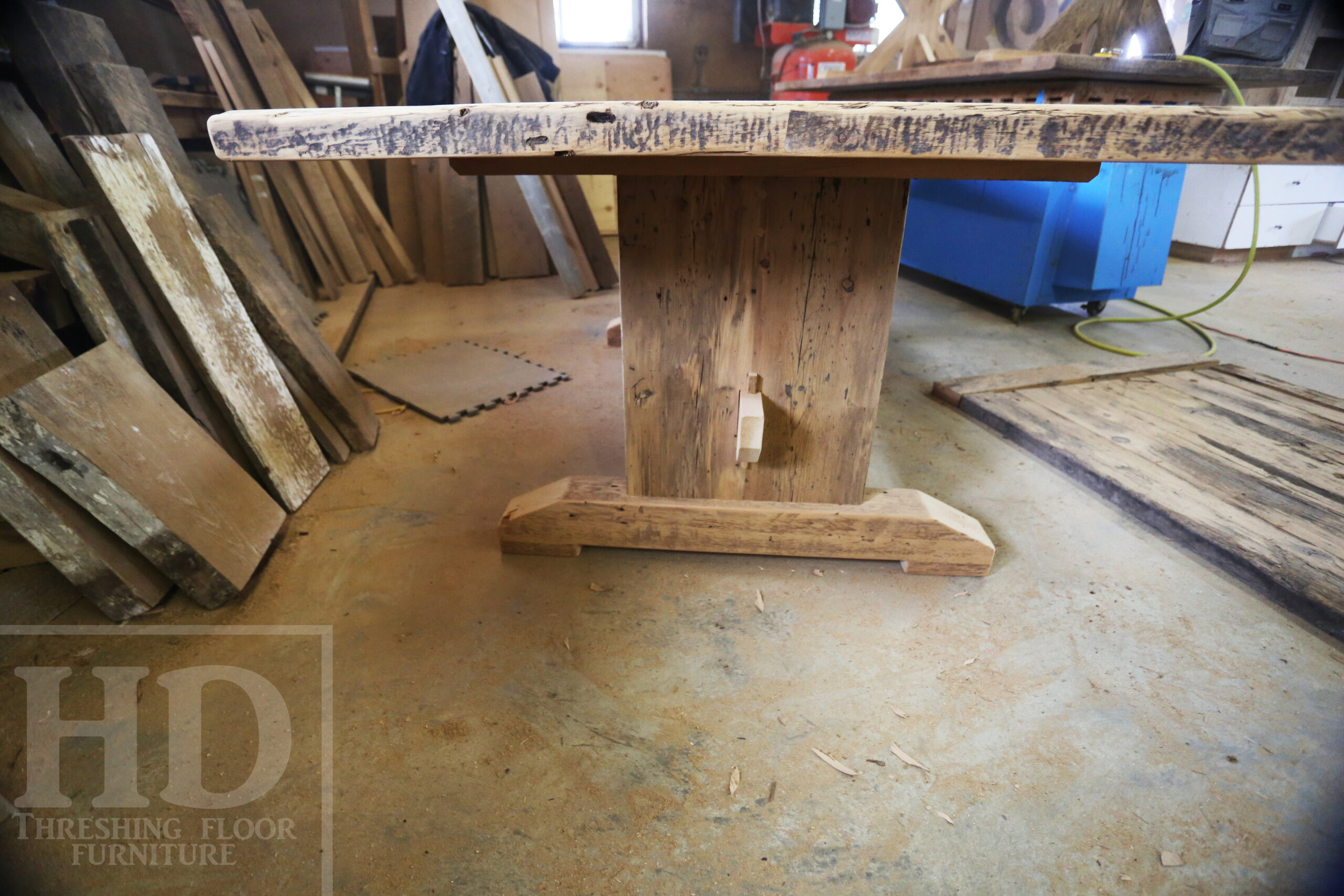 7' Ontario Barnwood Table for a Grassie, Ontario Home - 42" wide - Trestle Base - Reclaimed Old Growth Pine Threshing Floor Construction - Original Distressing & Character & Edges Maintained - Premium epoxy + satin polyurethane finish - One 18" Leaf Extension - 7' [matching] Trestle Bench - 5 Wormy Maple Chairs - Stained to match table - www.table.ca