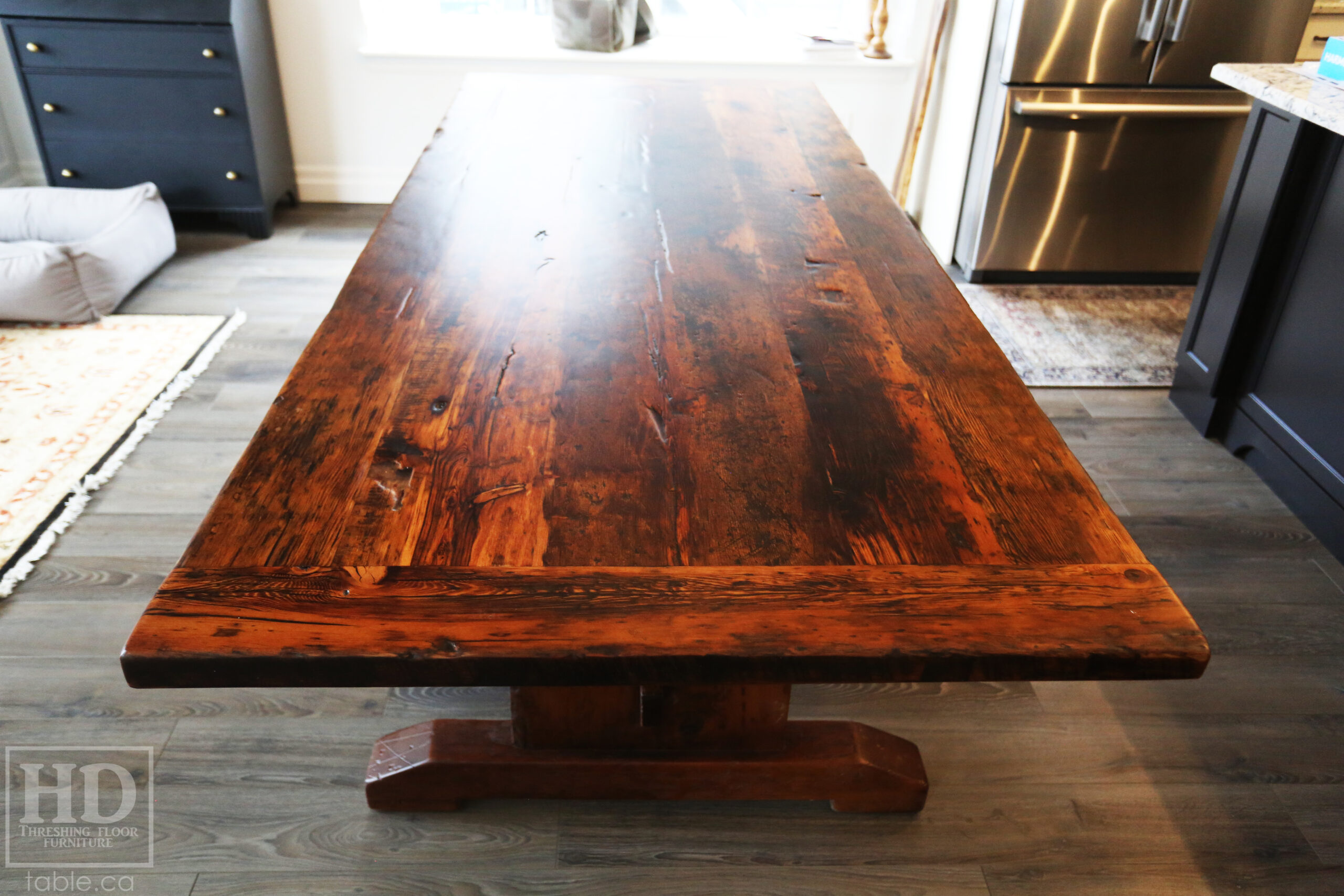 8' Ontario Barnwood table we made for a Blue Mountain, Ontario Home - 39" wide - Trestle Base - 2" Hemlock Threshing Floor Construction - Original barnwood edges & distressing maintained - Premium epoxy + matte polyurethane finish - www.table.ca