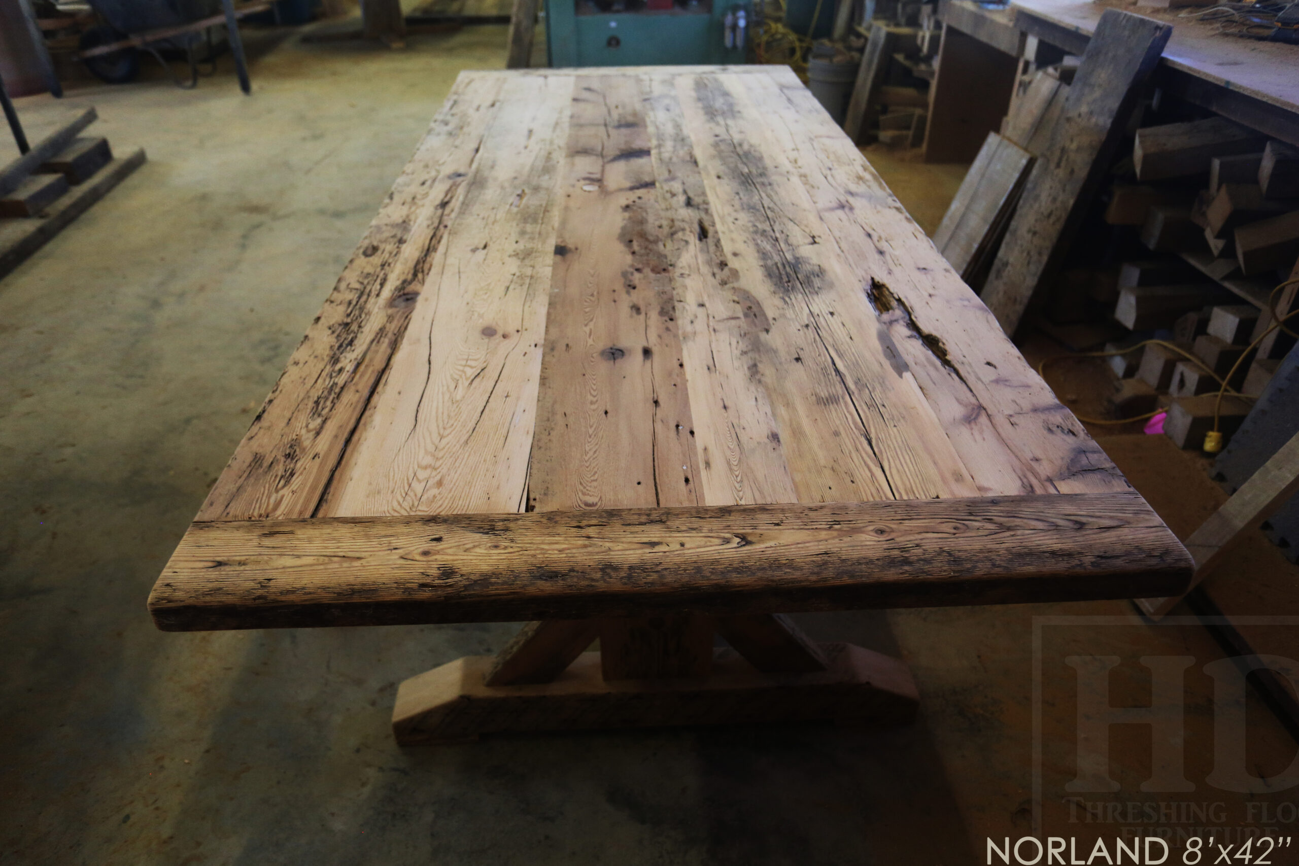 8' Ontario Barnwood Table we made for a Burlington, Ontario home - 42" wide - Sawbuck base - Original edges & distressing maintained - Old growth Hemlock Threshing Floor 2" Top - Premium epoxy + satin polyurethane finish - 8' [matching] bench - 6 Plank Back Chairs / Wormy Maple www.table.ca