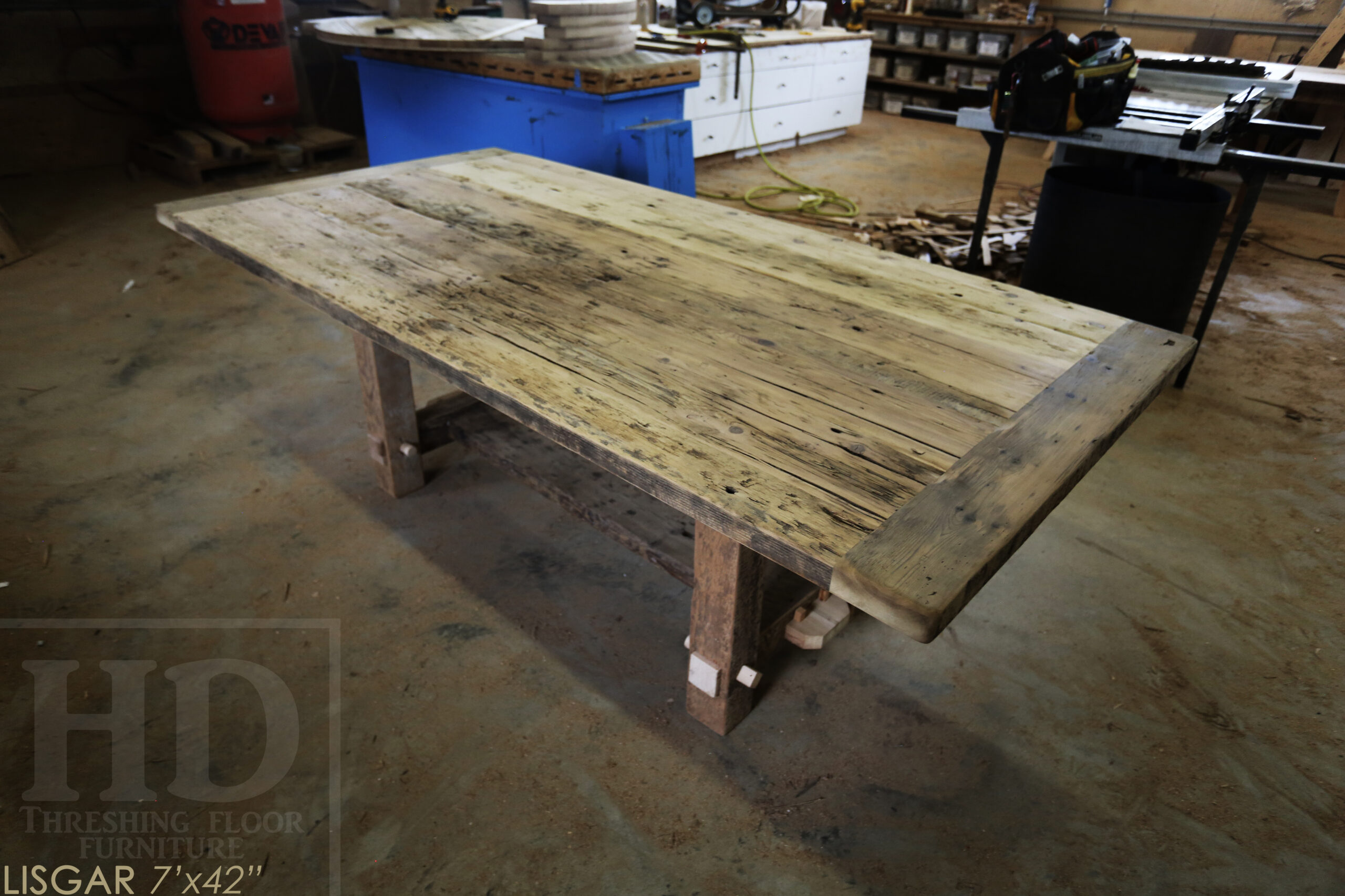 7' Ontario Barnwood table we made for a  Hamilton, Ontario Home - 42" wide -  2" Hemlock Threshing Floor Construction - Original Ontario barnwood edges & distressing maintained - Premium epoxy + satin polyurethane finish - www.table.ca
