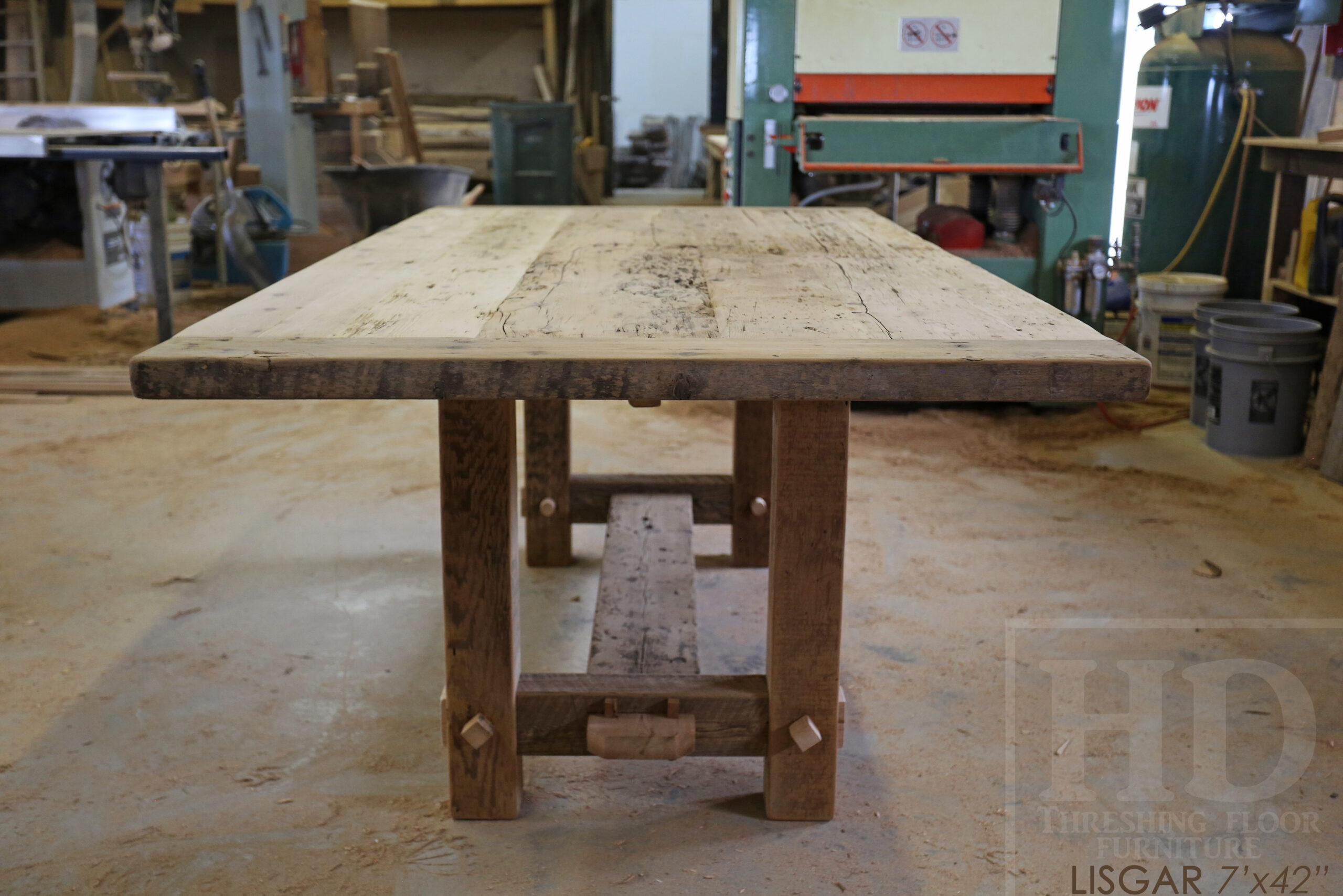 7' Ontario Barnwood table we made for a  Hamilton, Ontario Home - 42" wide -  2" Hemlock Threshing Floor Construction - Original Ontario barnwood edges & distressing maintained - Premium epoxy + satin polyurethane finish - www.table.ca