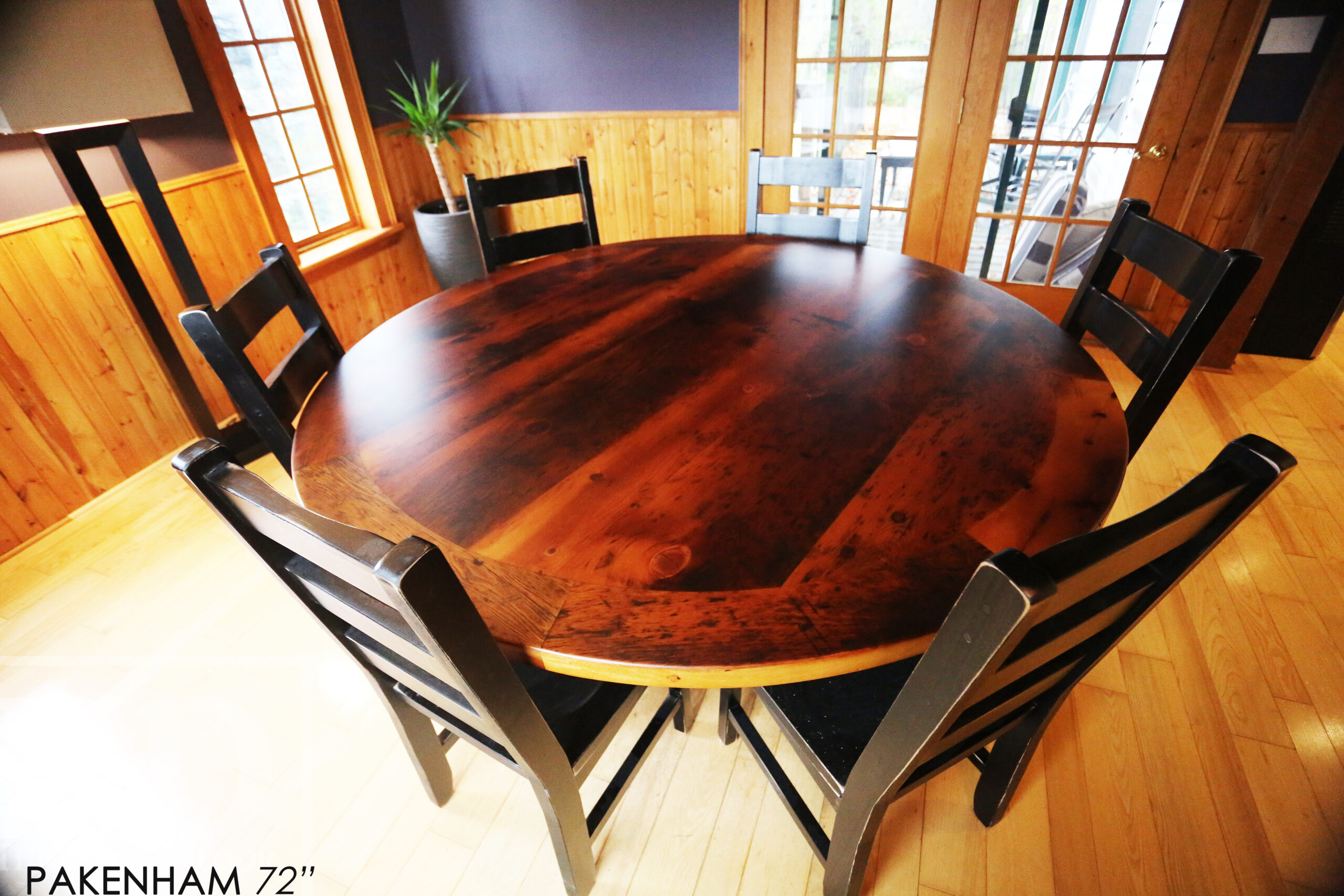 72" Round Ontario Barnwood Table we made for a Pakenham, Ontario Home - Reclaimed cedar hydro pole base - Old Growth Hemlock Threshing Floor Construction - Original Distressing & Character & Edges Maintained - Premium epoxy + matte polyurethane finish - 6 Ladder Back Chairs / Wormy Maple / Custom finished / Polyurethane clearcoat finish - www.table.ca