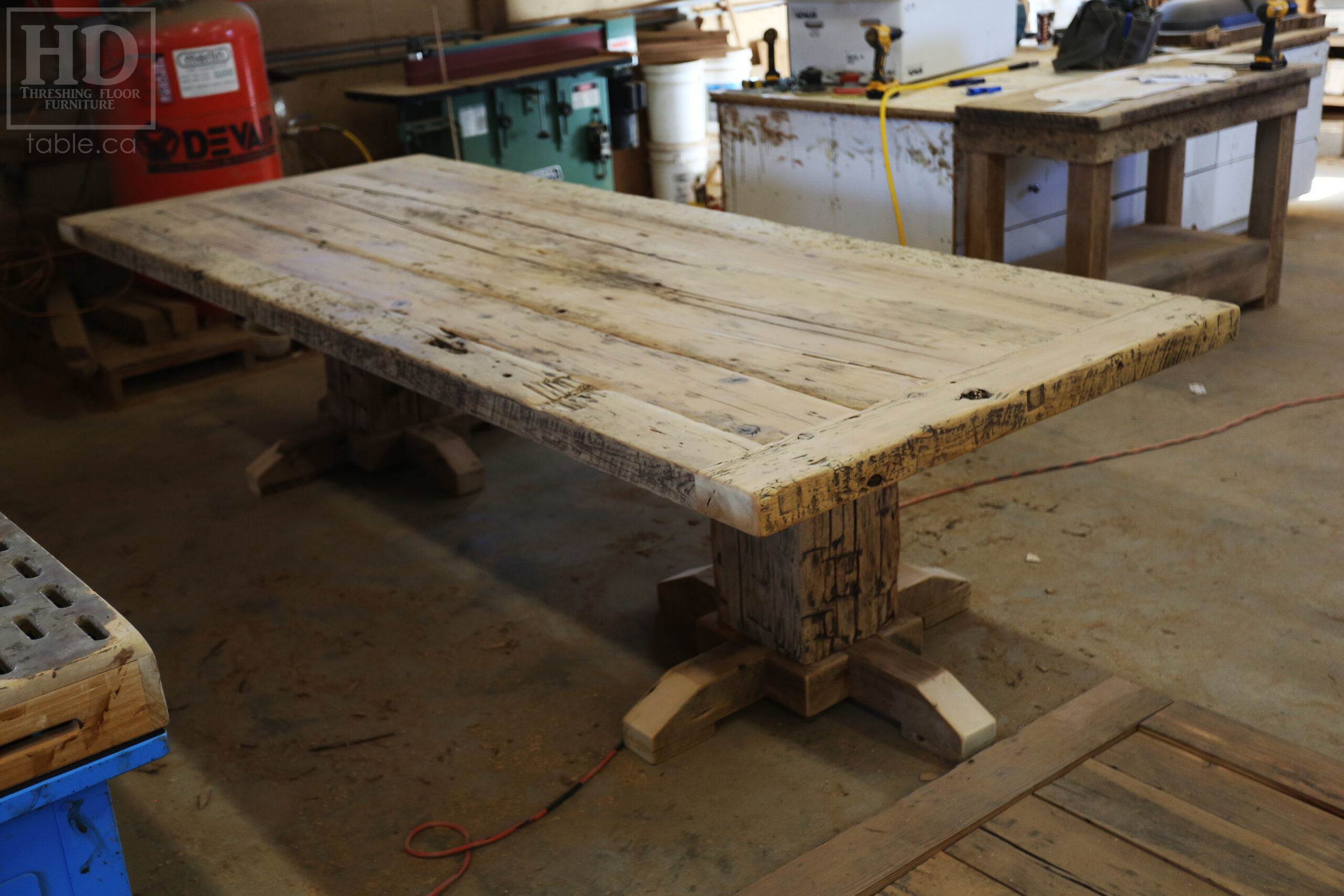 10' Ontario Barnwood Modern Table we made for a Port Perry, Ontario home - 48" wide - Hand-Hewn Beam Pedestals Base - 3" thick top top option - Mitred Corners - Hemlock Threshing Floor Construction - Original edges & distressing maintained - Premium epoxy + satin polyurethane finish - www.table.ca