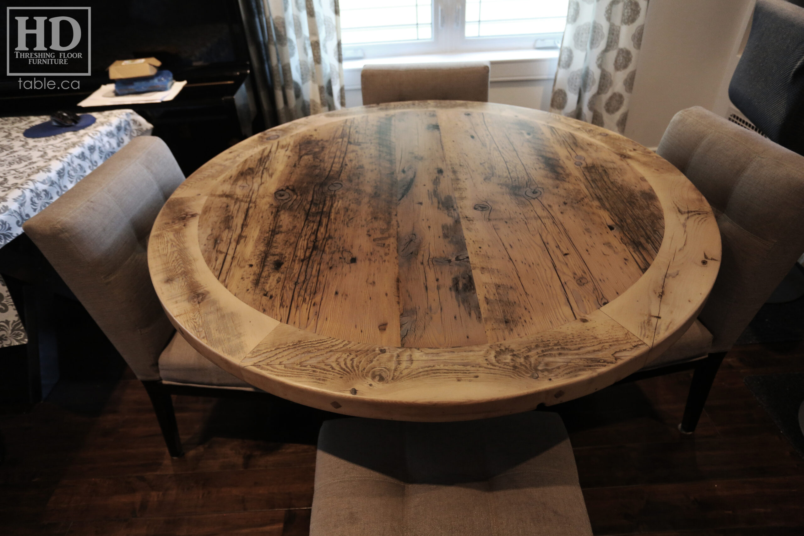50" Ontario Barnwood Round Table we made for an Toronto, Ontario home - Round Cedar Hydro Pole Base - 2" Hemlock Threshing Floor Top -  Original edges & distressing maintained - Greytone Treatment Option [maintains the light colour of unfinished] - Premium epoxy + matte polyurethane finish - www.table.ca