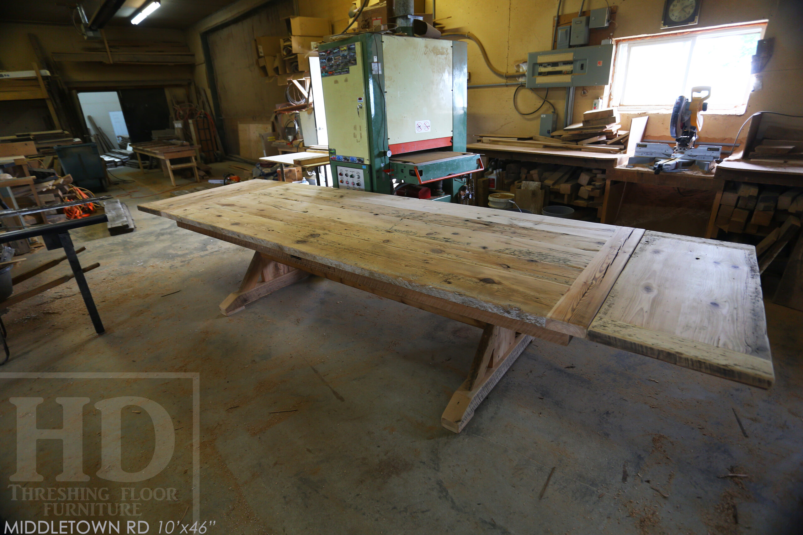 10' Ontario Barnwood Sawbuck Table we made for an Dundas, Ontario home - 46" wide - 2" Hemlock Threshing Floor Top - 3" skirting / 2 Drawers / Lee Valley Hardware Handle - Original edges & distressing maintained - Premium epoxy + satin polyurethane finish - Two 18" Leaf Extensions [making total length 13' when extended] - 10' [matching] Reclaimed Wood Bench with Trestle base - www.table.ca