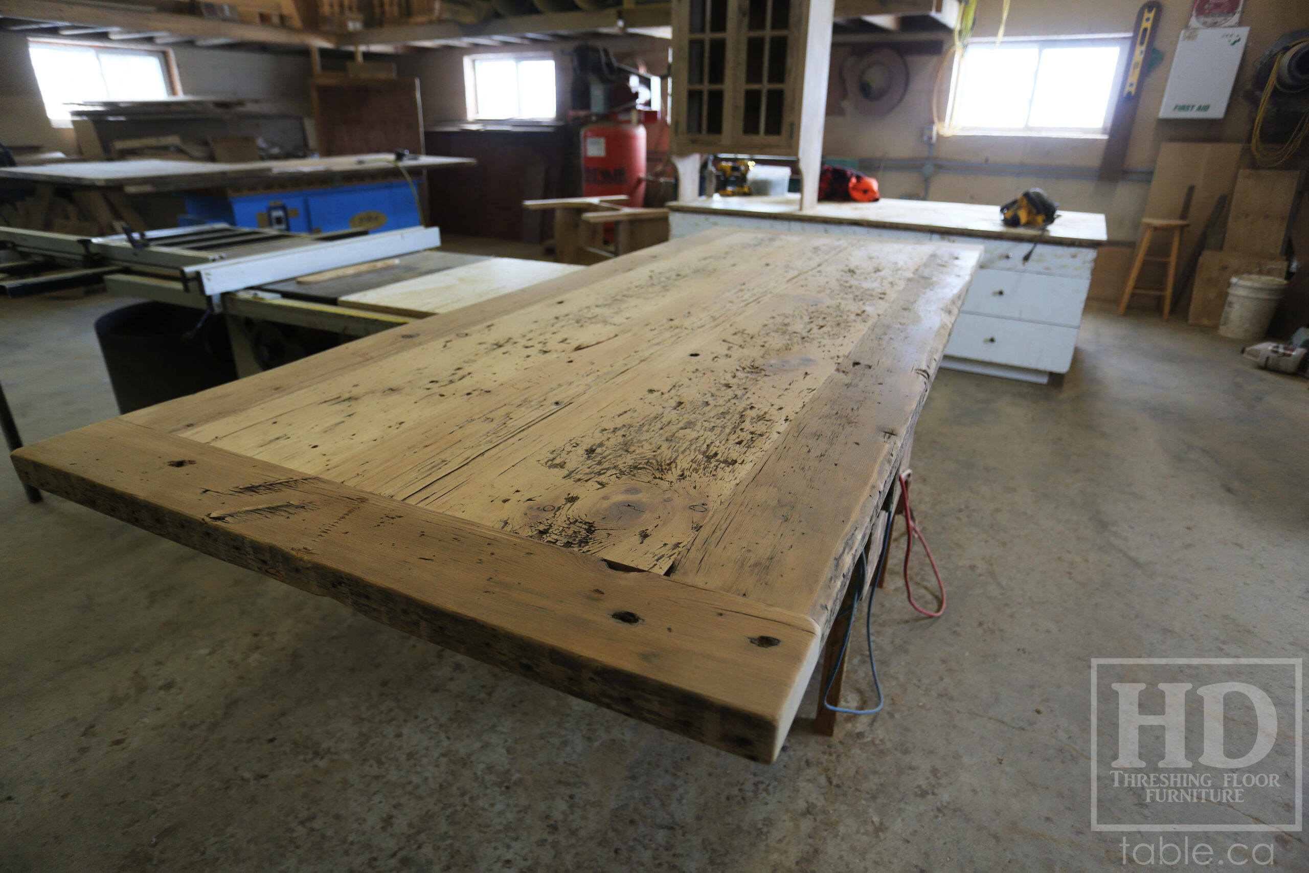 8' Ontario Barnwood Wood Table we made for an Oakville, Ontario home - 39" wide – Modern Plank Base – Reclaimed Old Growth Hemlock Threshing Floor Construction - Original edges & distressing maintained – Satin polyurethane finish [no epoxy filling] – www.table.ca