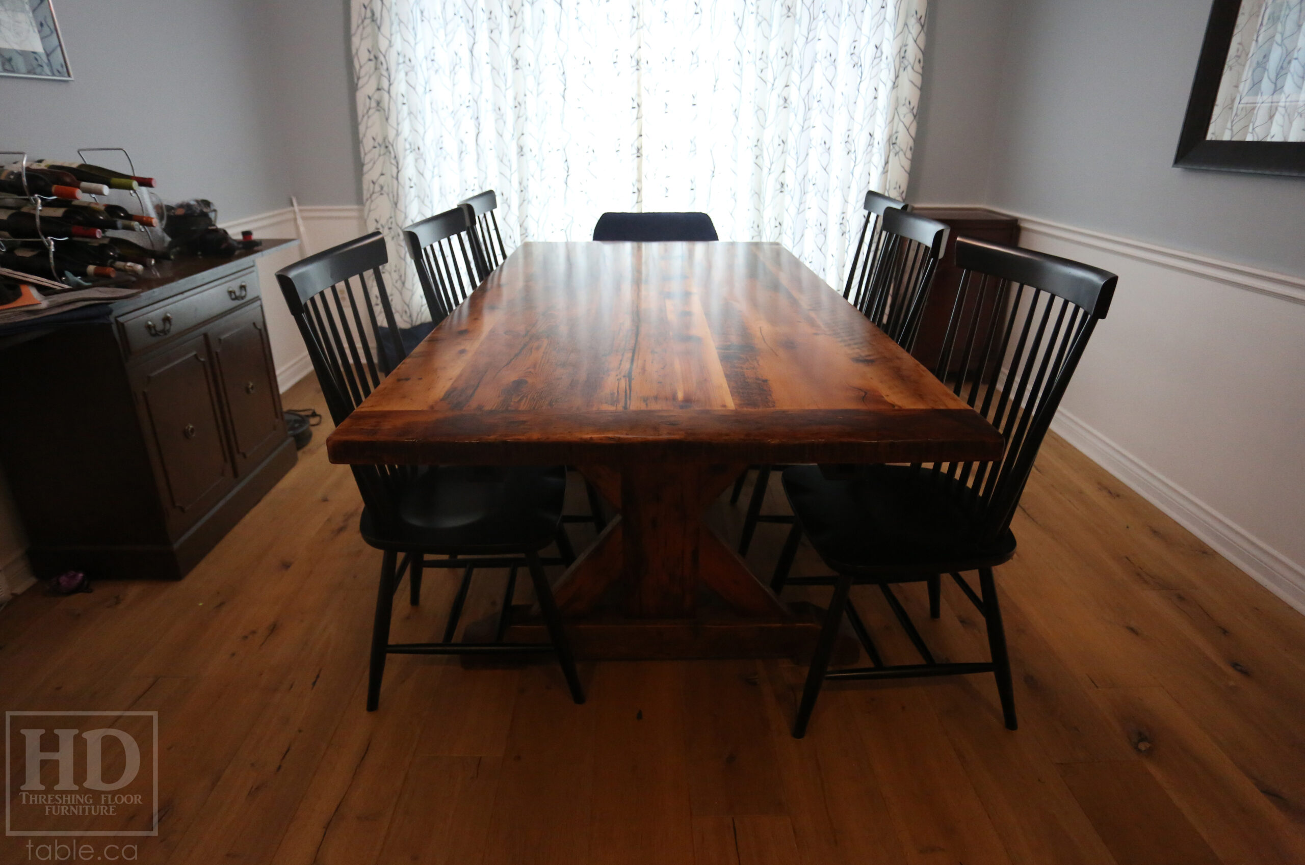 7' Ontario Barnwood Boardroom Table we made for a St. Catherines, Ontario Home â€“ Sawbuck Base - Old Growth Hemlock Threshing Floor Construction - Original Distressing & Edges Maintained - Premium epoxy + satin polyurethane finish â€“ Two 18â€ Leaf Extensions [making total length 10â€™ when extended] â€“ 6 Wormy Maple Shaker Chairs / Painted Solid Black / Satin polyurethane clearcoat finish - www.table.ca