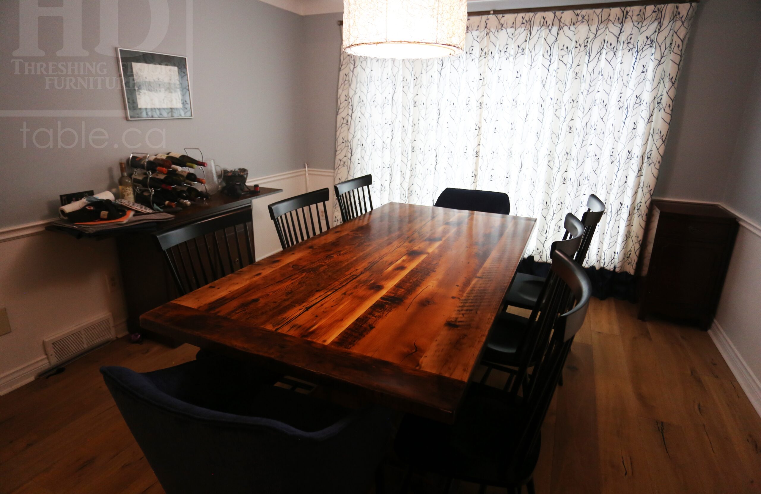 7' Ontario Barnwood Boardroom Table we made for a St. Catherines, Ontario Home â€“ Sawbuck Base - Old Growth Hemlock Threshing Floor Construction - Original Distressing & Edges Maintained - Premium epoxy + satin polyurethane finish â€“ Two 18â€ Leaf Extensions [making total length 10â€™ when extended] â€“ 6 Wormy Maple Shaker Chairs / Painted Solid Black / Satin polyurethane clearcoat finish - www.table.ca