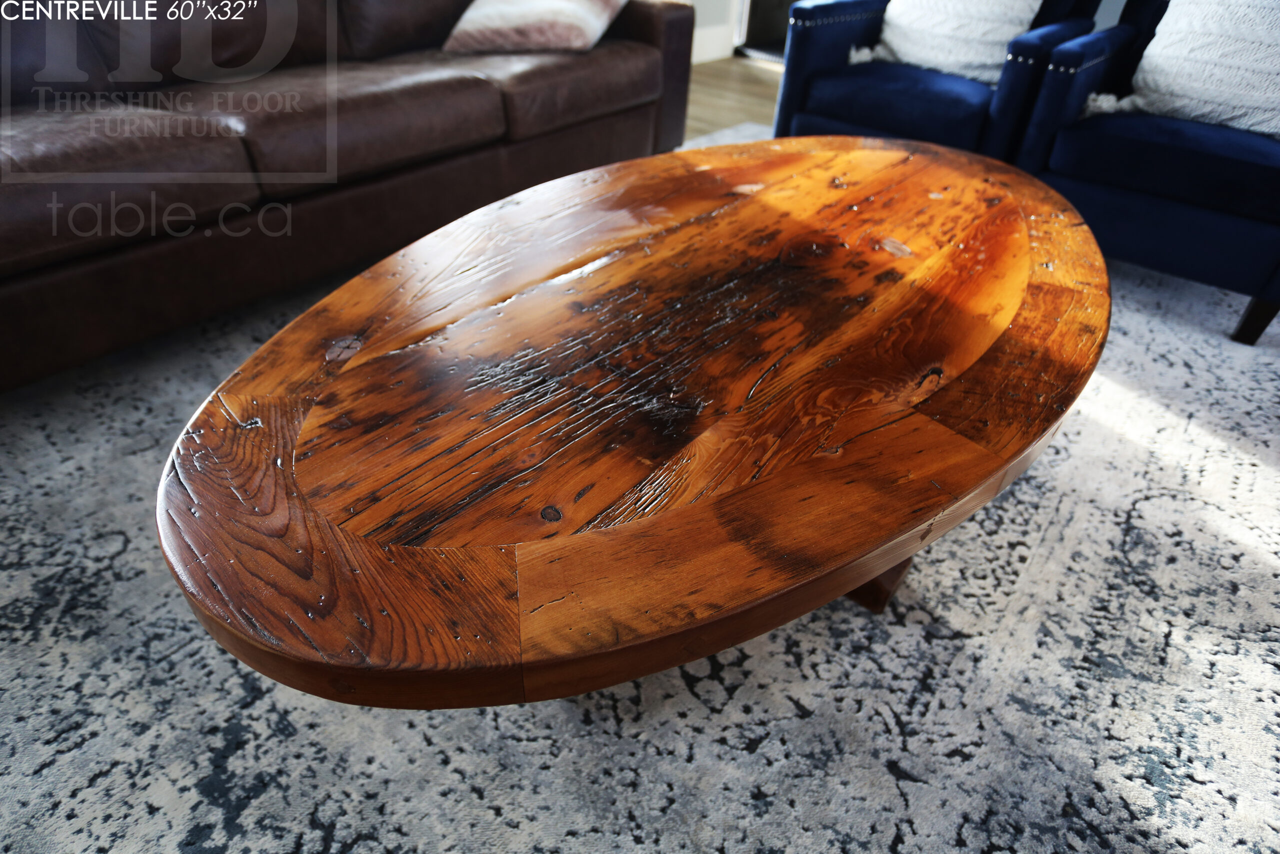 60" Ontario Barnwood Coffee Table we made for an Ingersoll, Ontario home - 32" wide in centre - Eliptical shaped - Hand-Hewn Beam Pedestal Base - 2" Old Growth Pine Threshing Floor Construction top - Original edges & distressing maintained - Satin polyurethane finish - www.table.ca
