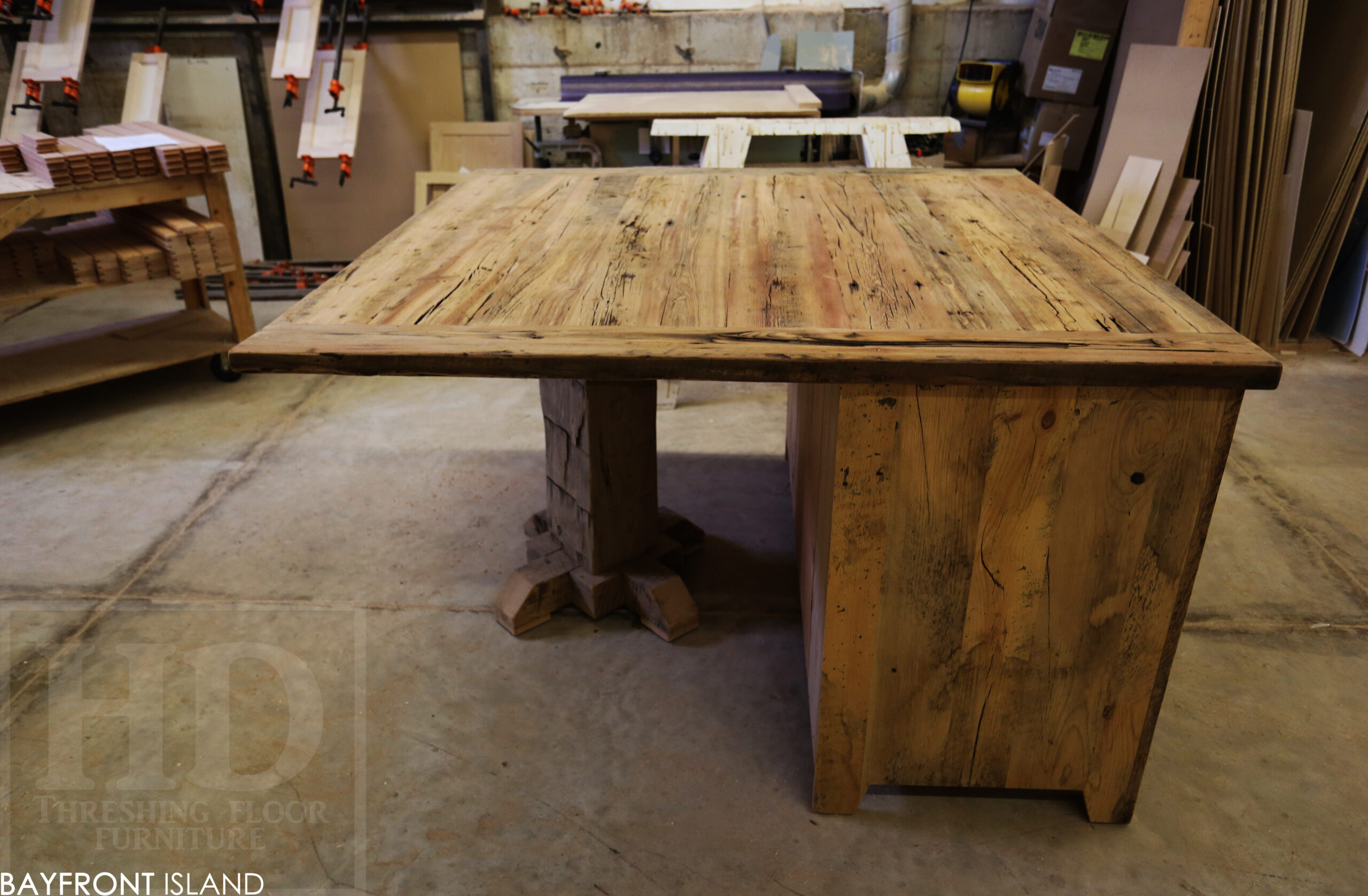 5’ x 5’ Ontario Barnwood Island - 36” height – Reclaimed Hemlock Threshing Floor & Grainery Board Construction – Mission Cast Brass Lee Valley Hardware – Original edges & distressing maintained – Pedestal Post to Support Overhang – www.table.ca