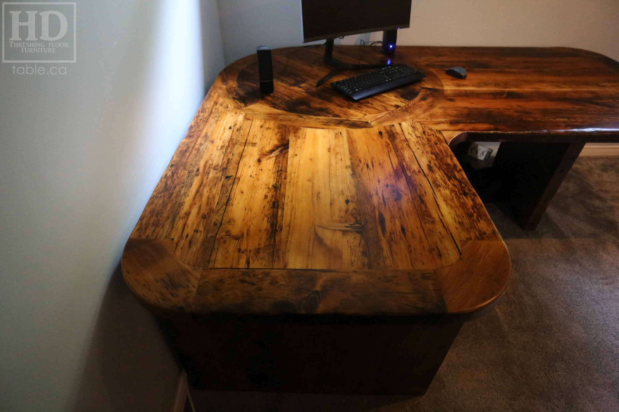 Ontario Barnwood L Shaped Desk we made for a Waterloo, Ontario home office - Reclaimed Hemlock Threshing Floor & Grainery Board Construction â€“ 2 Drawers / Mission Cast Brass Lee Valley Hardware â€“ Plank Post - Original edges & distressing maintained â€“ Premium epoxy + satin polyurethane finish - www.table.ca