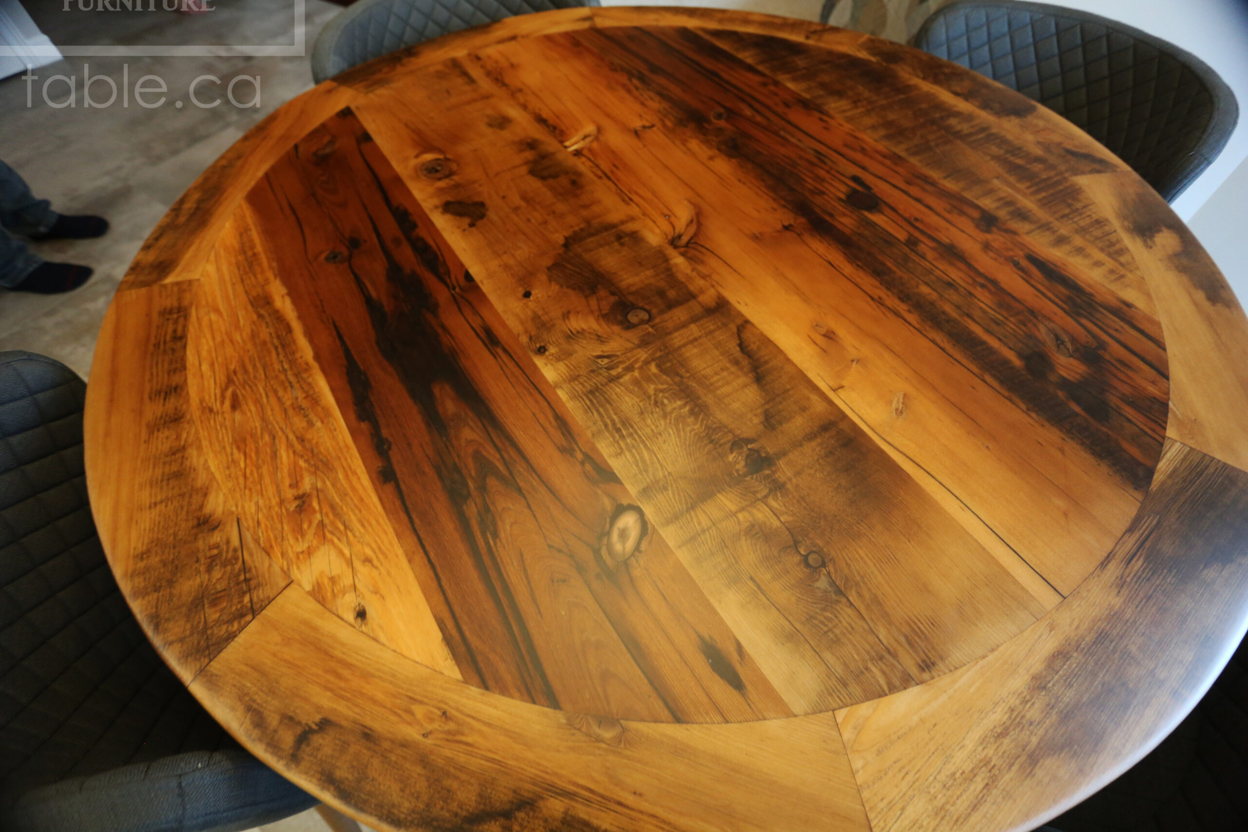 52â€ Ontario Barnwood Table â€“ Hand-Hewn Beam Pedestal Base â€“ Hemlock Threshing Floor Construction â€“ Original edges & distressing maintained â€“ Premium epoxy + matte polyurethane finish / www.table.ca