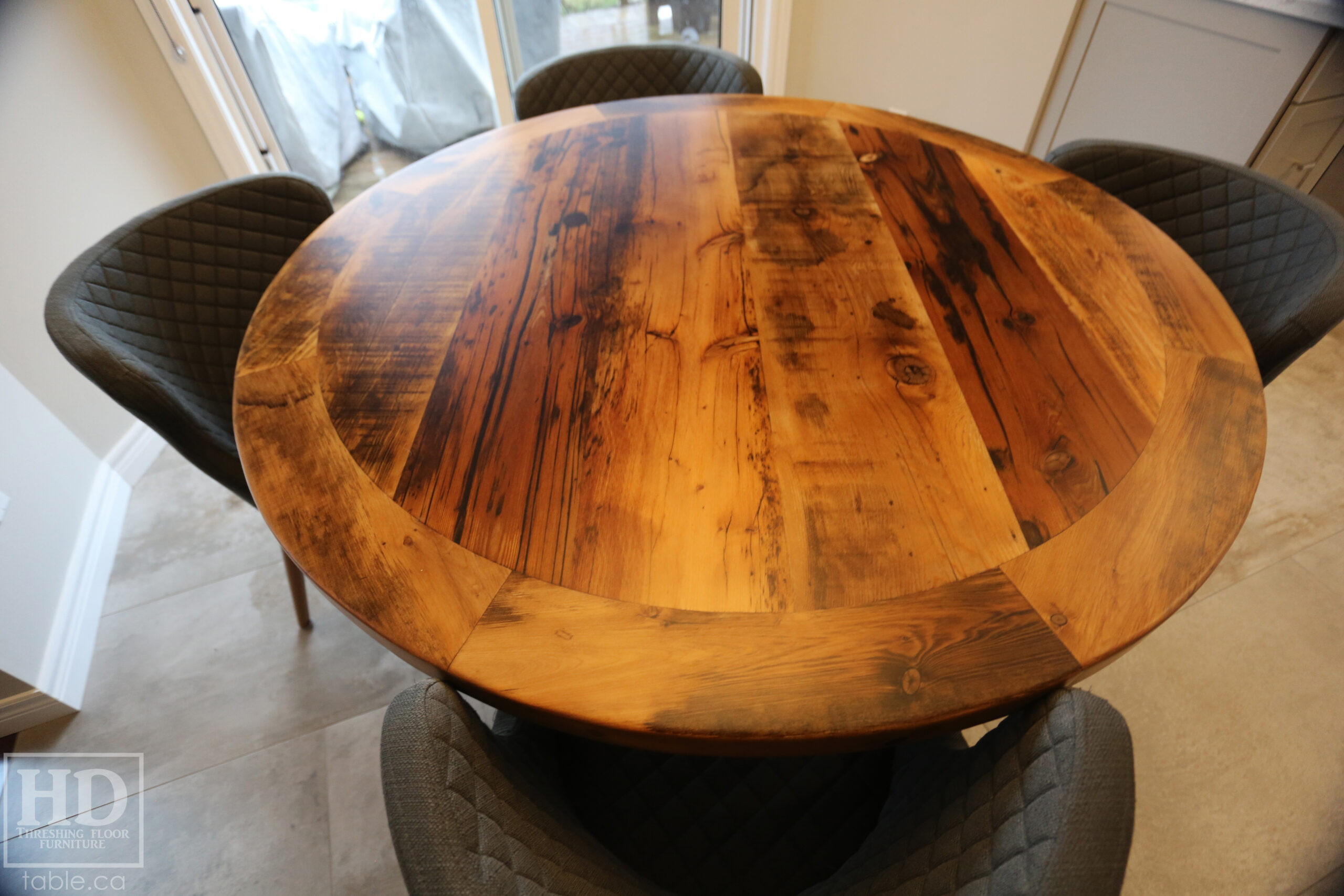 52â€ Ontario Barnwood Table â€“ Hand-Hewn Beam Pedestal Base â€“ Hemlock Threshing Floor Construction â€“ Original edges & distressing maintained â€“ Premium epoxy + matte polyurethane finish / www.table.ca