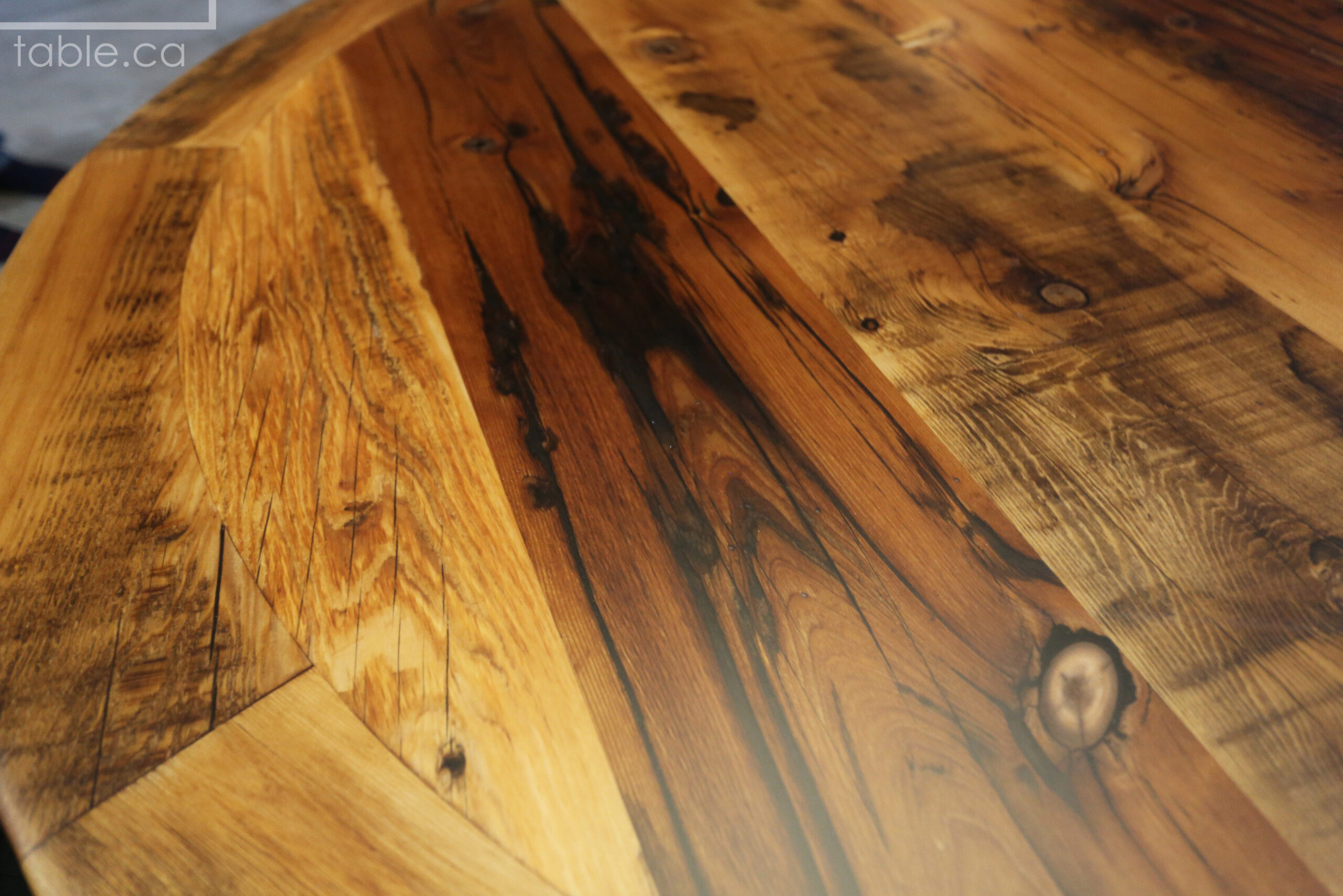 52â€ Ontario Barnwood Table â€“ Hand-Hewn Beam Pedestal Base â€“ Hemlock Threshing Floor Construction â€“ Original edges & distressing maintained â€“ Premium epoxy + matte polyurethane finish / www.table.ca