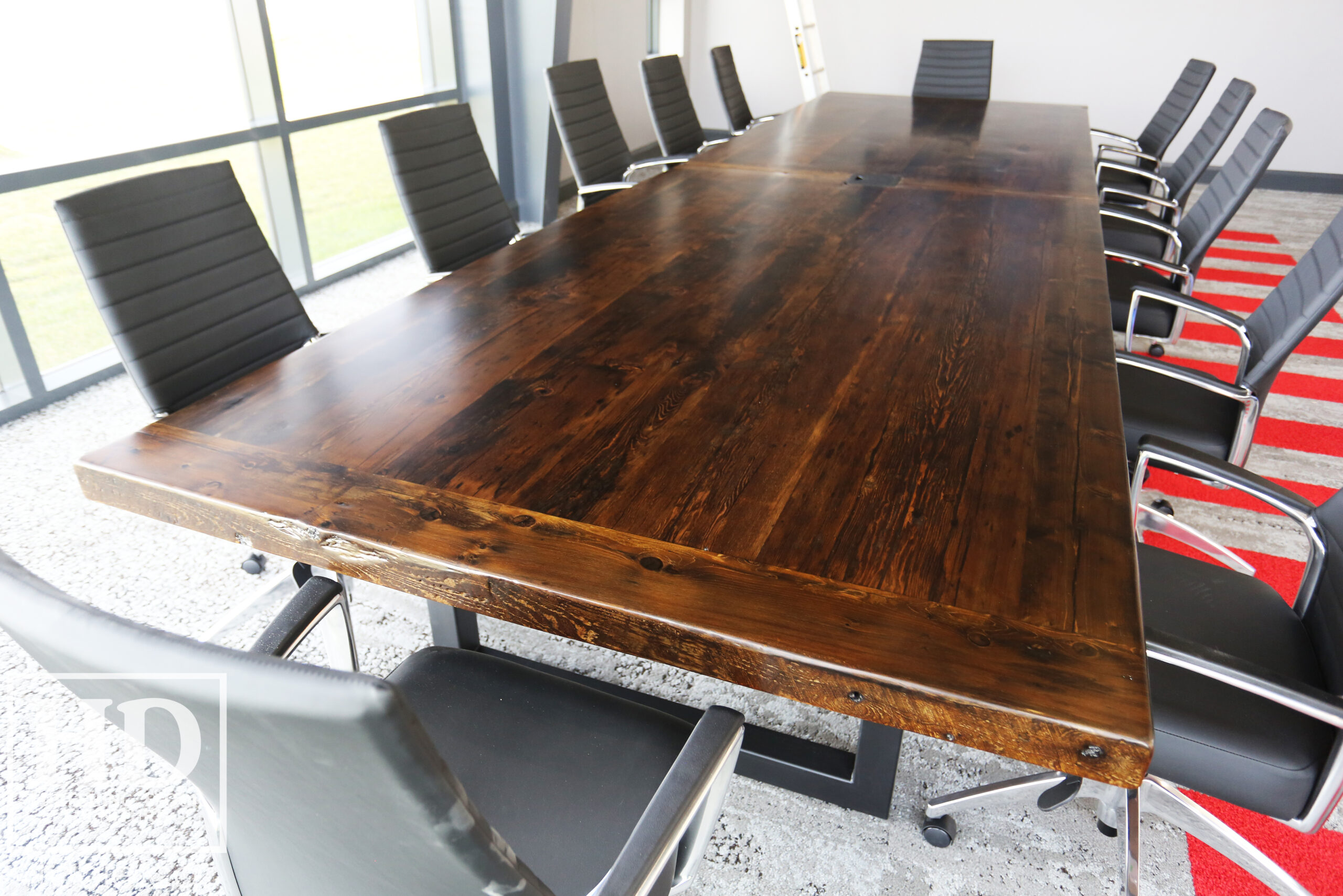 Project details: 17' Ontario Barnwood Boardroom Wood Table we made for a Beamsville, Ontario company - 60" wide – Steel U Shaped Base – Reclaimed Old Growth Hemlock Threshing Floor Construction – Black Stain Option – Centre on-site doweling - Original edges & distressing maintained – Premium epoxy + Satin polyurethane finish  – www.table.ca