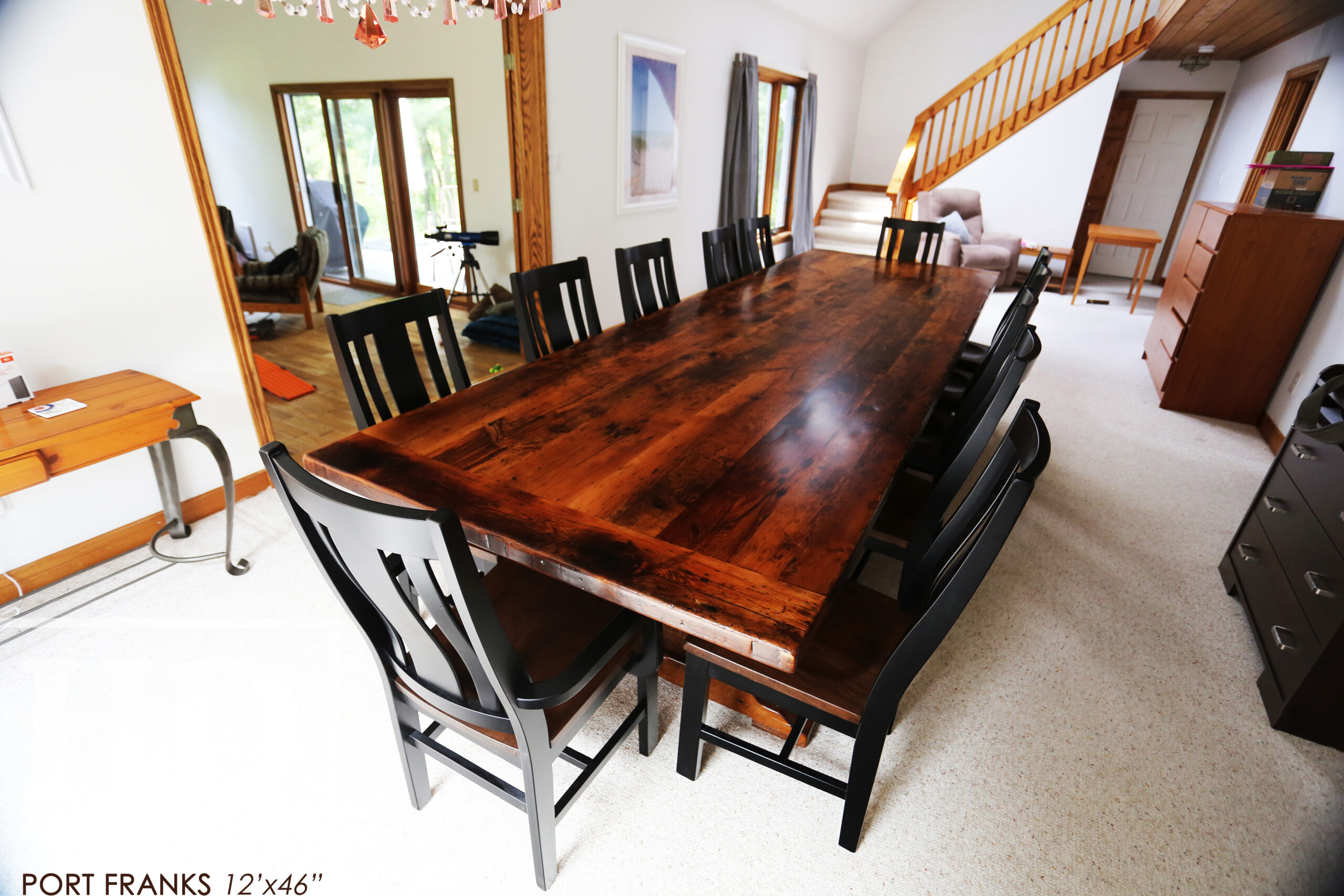 12’ Reclaimed Ontario Barnwood Trestle Table we made for a Toronto, Ontario home – 46” wide -  Violin Shaped Profile Base – Reclaimed Hemlock Threshing Floor Construction – Original edges & distressing maintained - Premium epoxy + satin polyurethane finish – 12 Sorority Chairs / Wormy Maple – Black Painted Frame / Seat Stained Colour of Table / Polyurethane clearcoat finish - www.table.ca