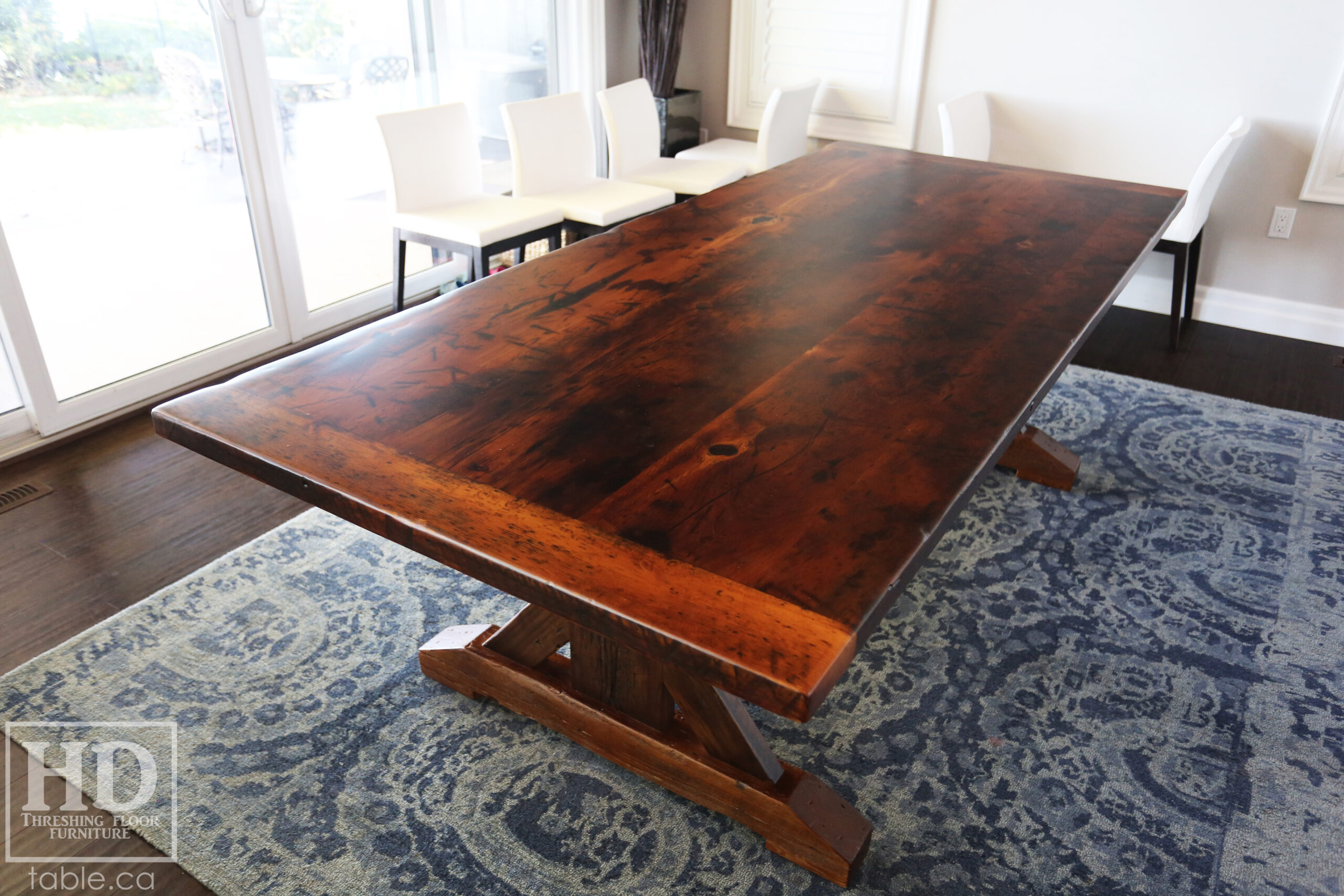 8 ft Reclaimed Ontario Barnwood Table we made for a Sarnia, Ontario home - 42” wide – Sawbuck Base - Reclaimed Hemlock Threshing Floor Construction – Original edges & distressing maintained – Premium epoxy + matte polyurethane finish - www.table.ca