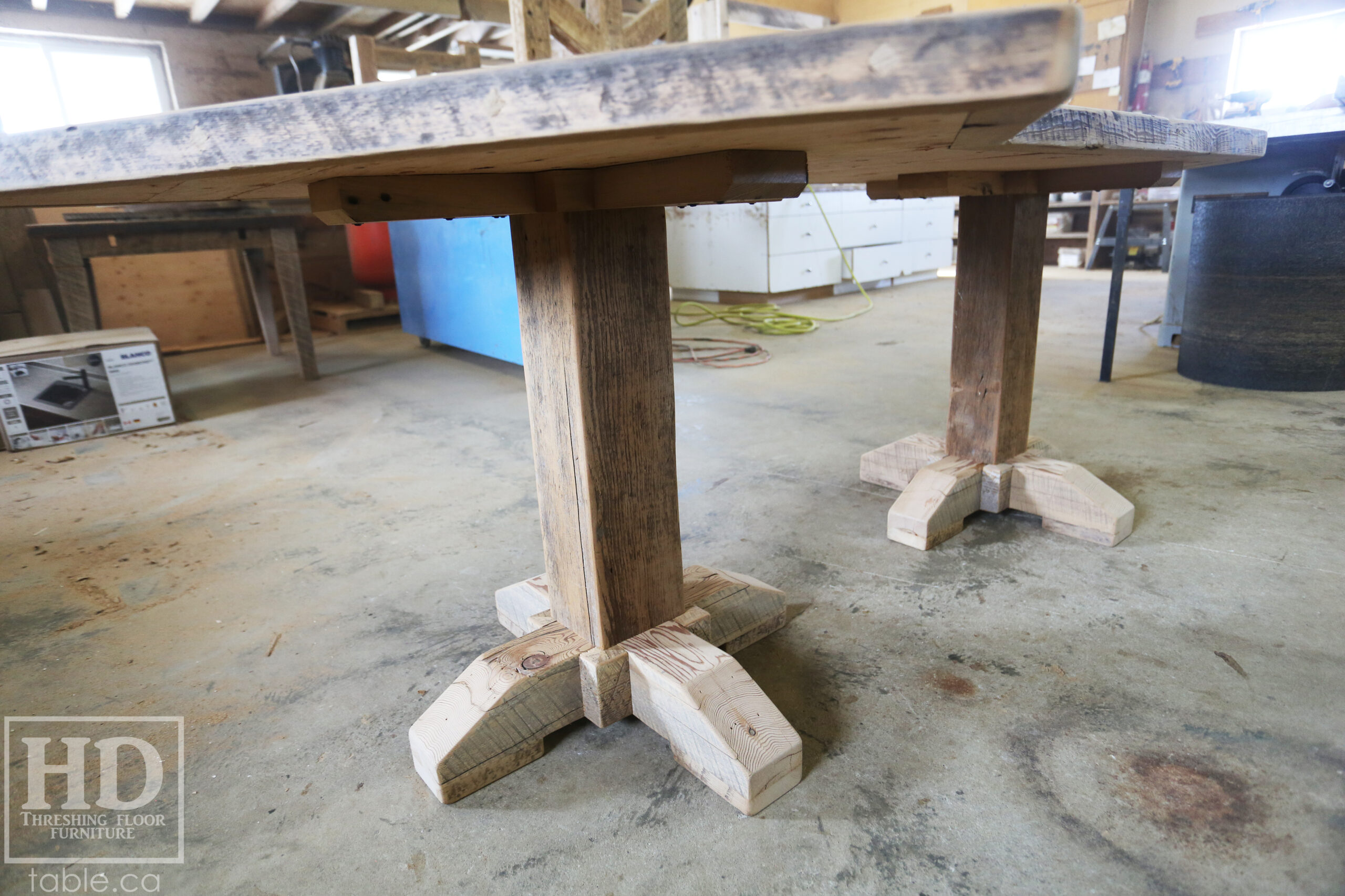 Custom Ontario Barnwood Desk â€“ Barn Beam Posts â€“ Modified Shape to Accommodate a Unique Space - Reclaimed Hemlock Threshing Floor 2â€ Top â€“ Original edges & distressing maintained  â€“ www.table.ca