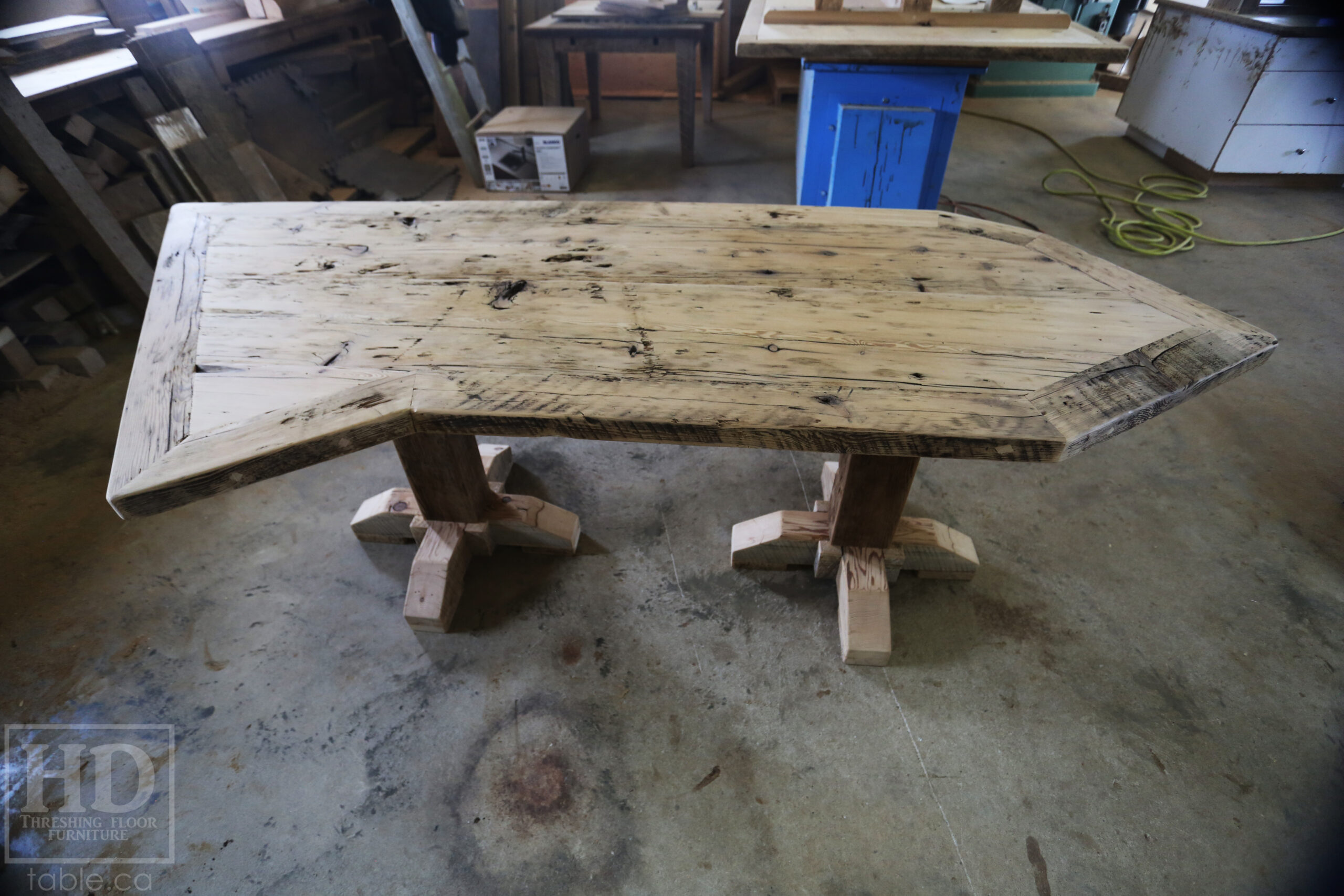 Custom Ontario Barnwood Desk â€“ Barn Beam Posts â€“ Modified Shape to Accommodate a Unique Space - Reclaimed Hemlock Threshing Floor 2â€ Top â€“ Original edges & distressing maintained  â€“ www.table.ca