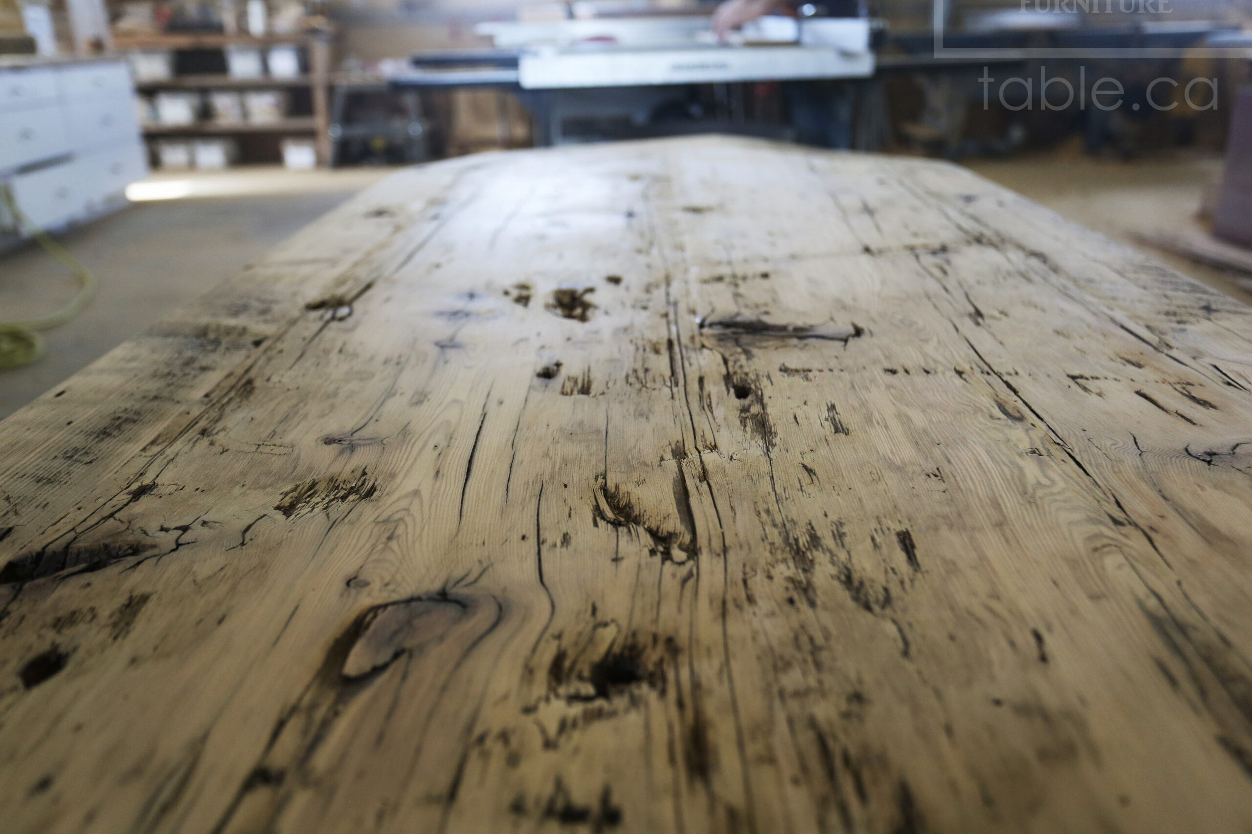 Custom Ontario Barnwood Desk â€“ Barn Beam Posts â€“ Modified Shape to Accommodate a Unique Space - Reclaimed Hemlock Threshing Floor 2â€ Top â€“ Original edges & distressing maintained  â€“ www.table.ca