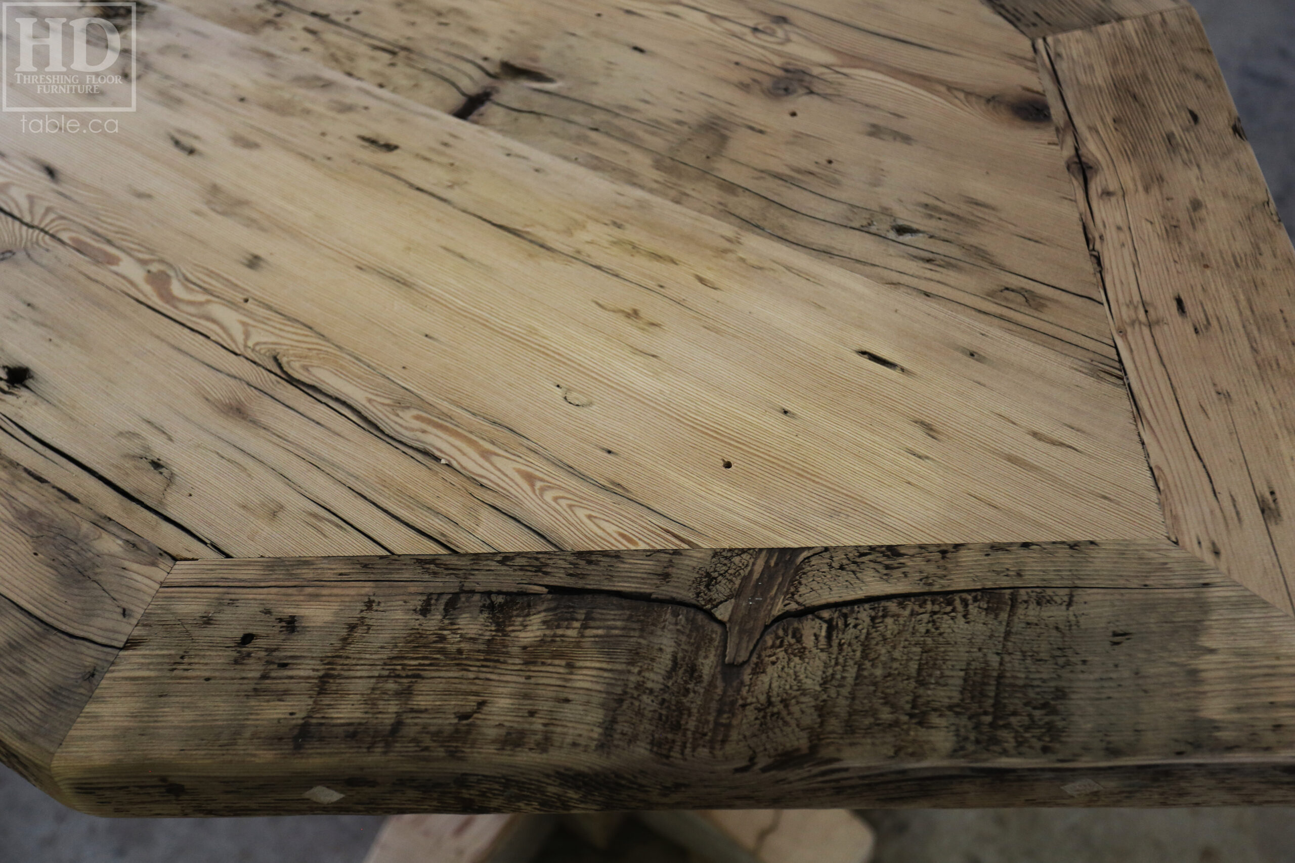 Custom Ontario Barnwood Desk â€“ Barn Beam Posts â€“ Modified Shape to Accommodate a Unique Space - Reclaimed Hemlock Threshing Floor 2â€ Top â€“ Original edges & distressing maintained  â€“ www.table.ca