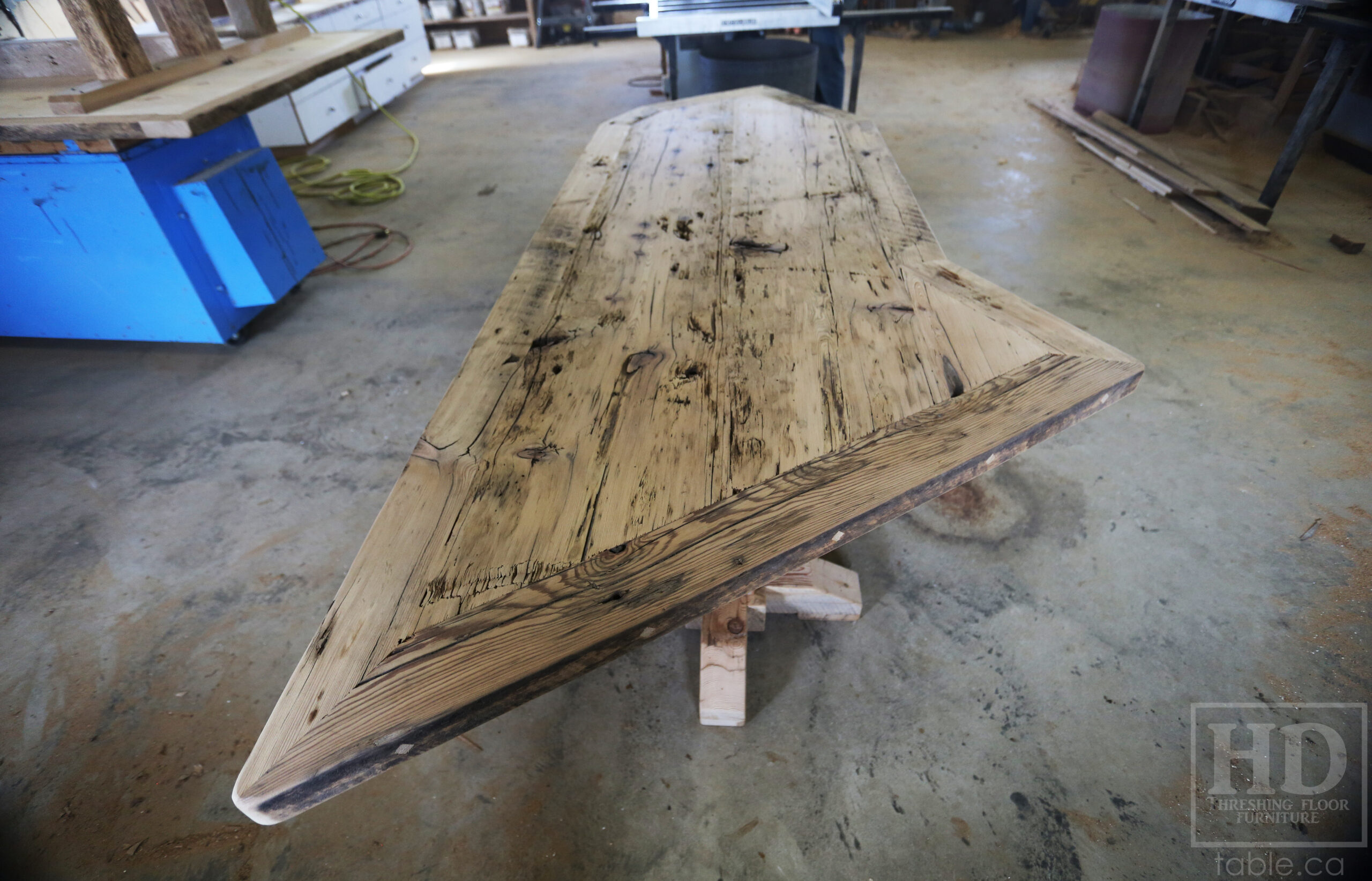 Custom Ontario Barnwood Desk â€“ Barn Beam Posts â€“ Modified Shape to Accommodate a Unique Space -Reclaimed Hemlock Threshing Floor 2â€ Top â€“ Original edges & distressing maintained  â€“ www.table.ca