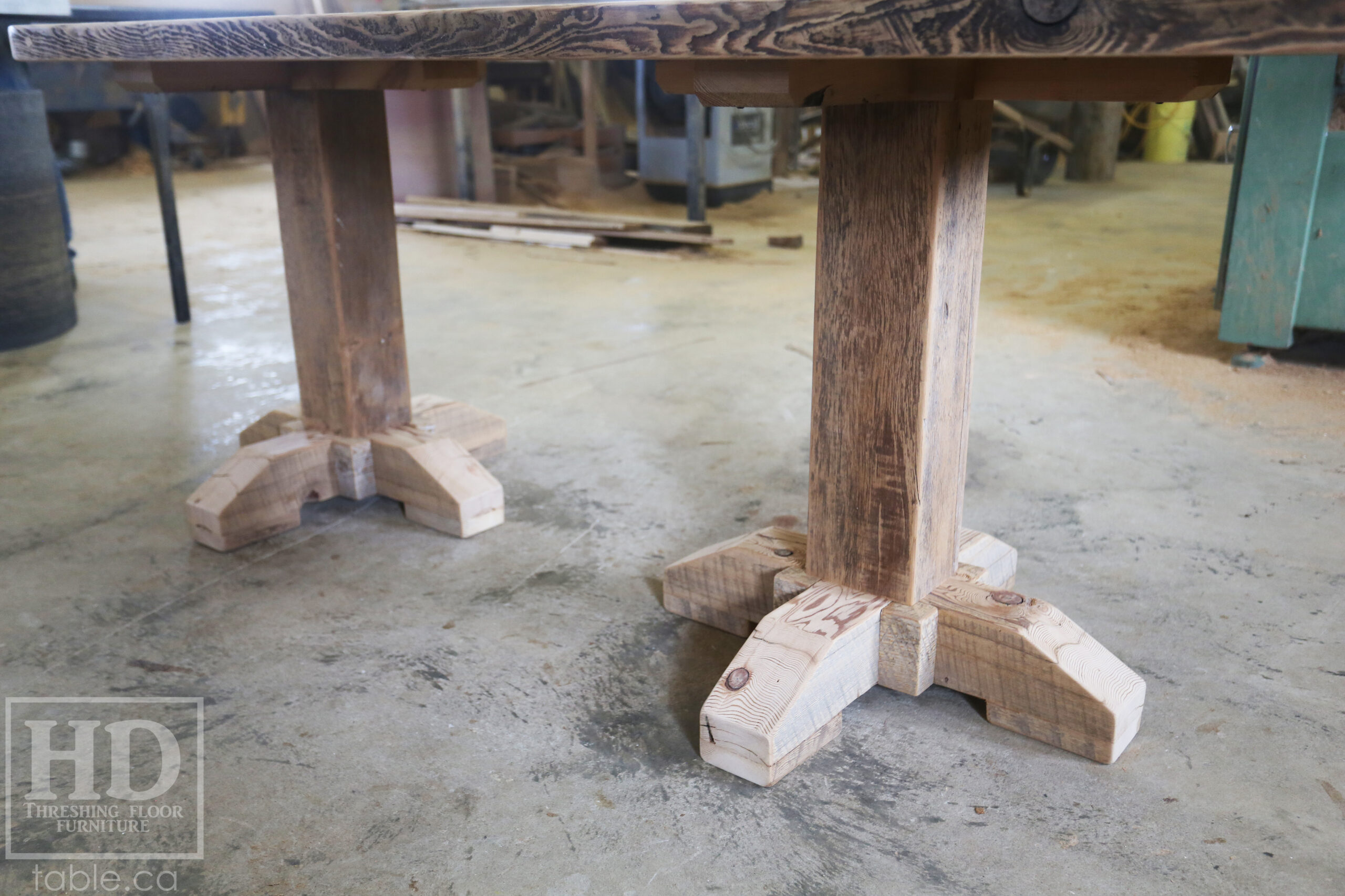 Custom Ontario Barnwood Desk â€“ Barn Beam Posts â€“ Modified Shape to Accommodate a Unique Space - Reclaimed Hemlock Threshing Floor 2â€ Top â€“ Original edges & distressing maintained  â€“ www.table.ca