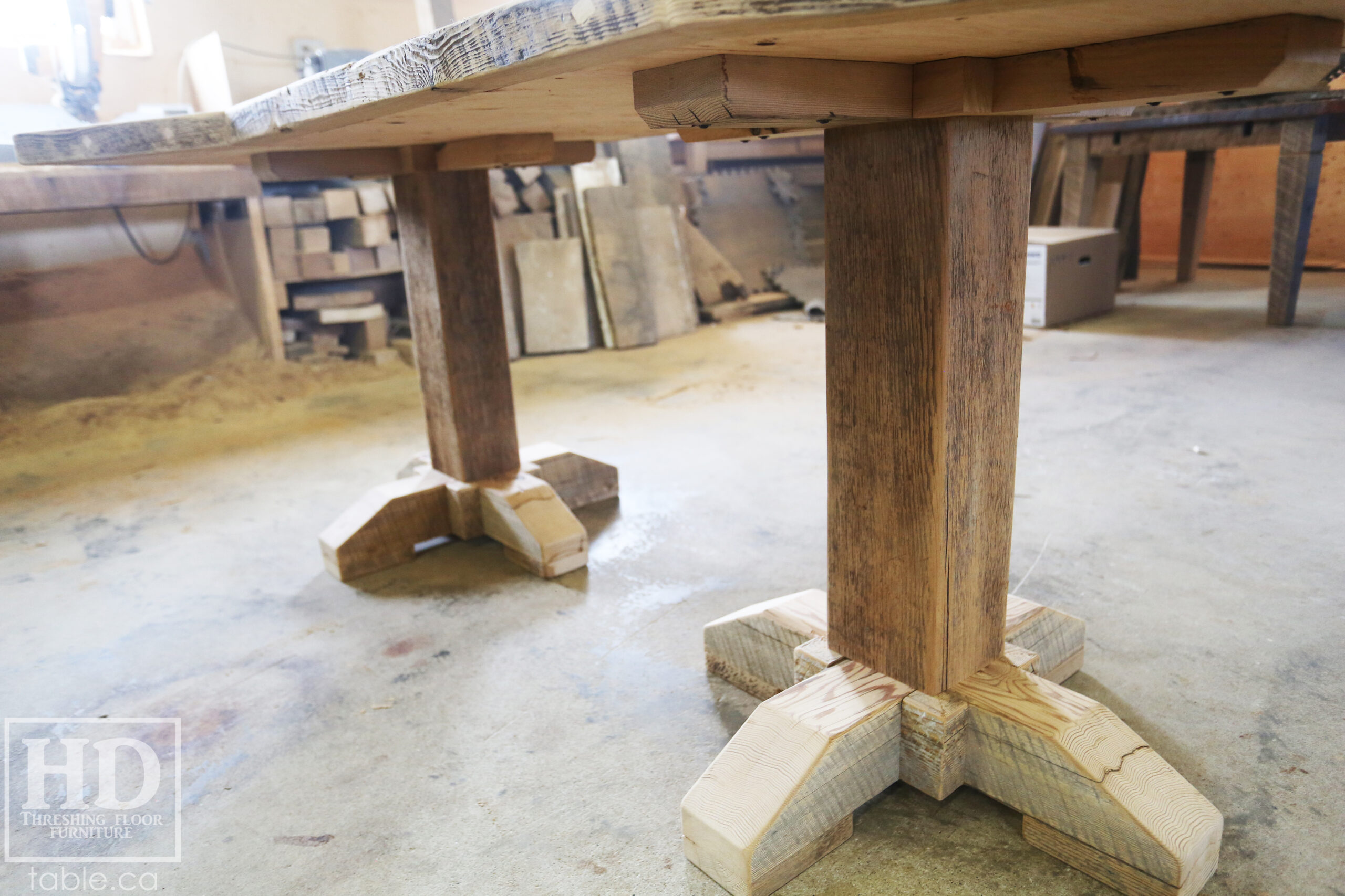 Custom Ontario Barnwood Desk â€“ Barn Beam Posts â€“ Modified Shape to Accommodate a Unique Space - Reclaimed Hemlock Threshing Floor 2â€ Top â€“ Original edges & distressing maintained  â€“ www.table.ca