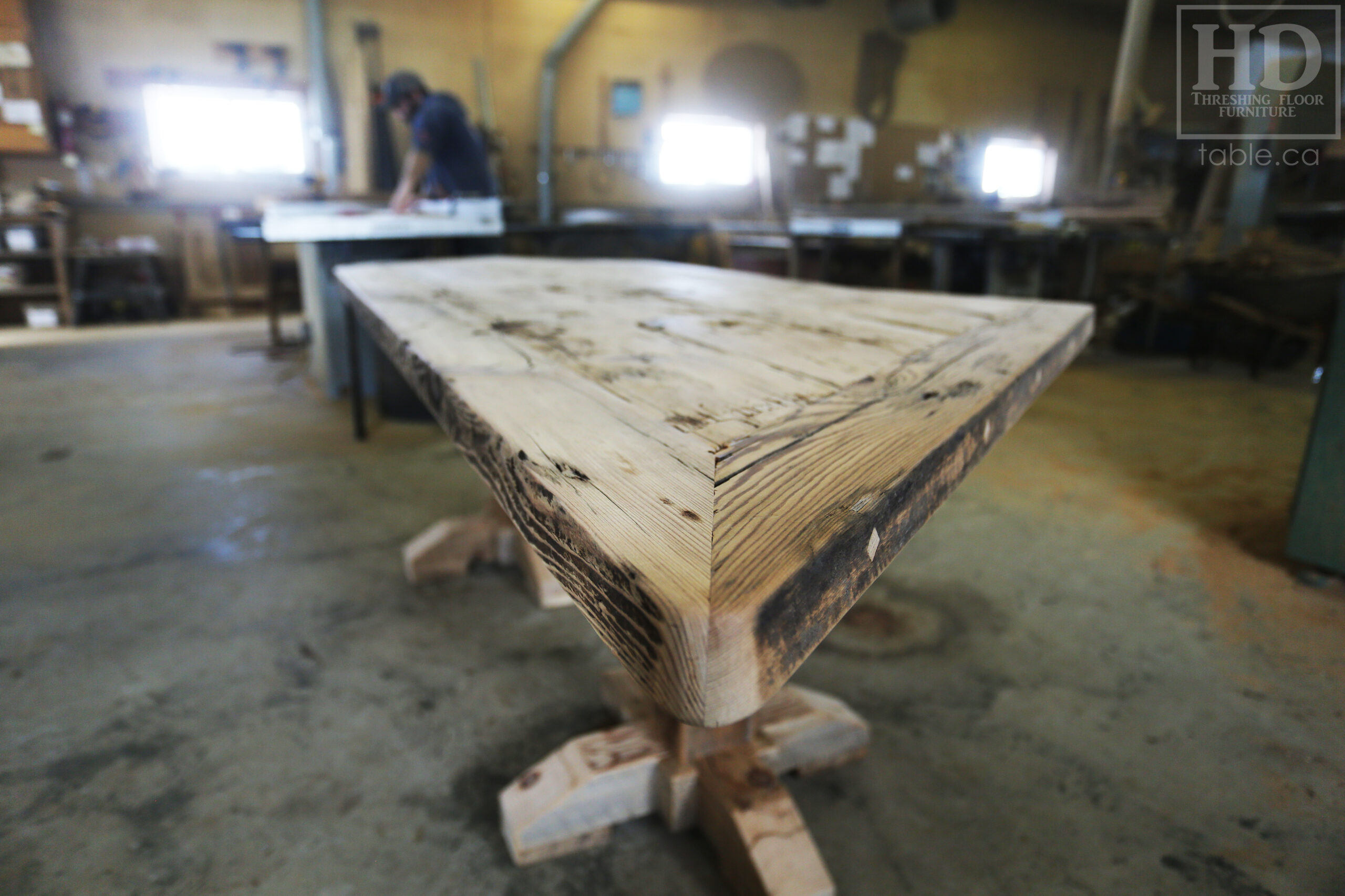 Custom Ontario Barnwood Desk â€“ Barn Beam Posts â€“ Modified Shape to Accommodate a Unique Space - Reclaimed Hemlock Threshing Floor 2â€ Top â€“ Original edges & distressing maintained  â€“ www.table.ca