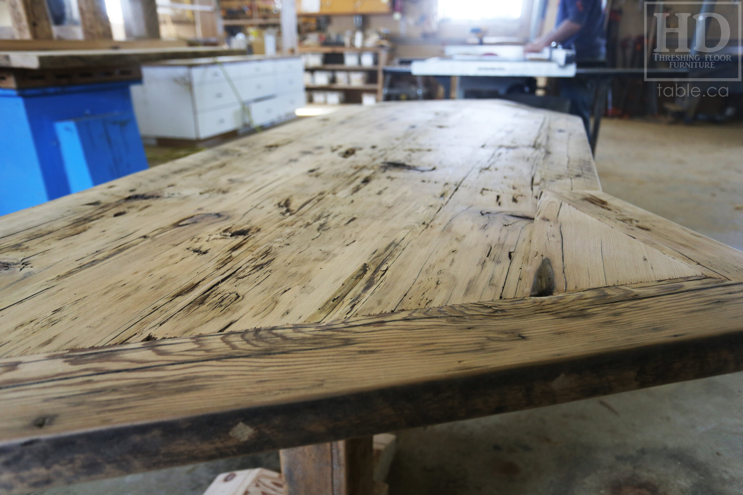 Custom Ontario Barnwood Desk – Barn Beam Posts – Modified Shape to Accommodate a Unique Space - Reclaimed Hemlock Threshing Floor 2” Top – Original edges & distressing maintained  – www.table.ca