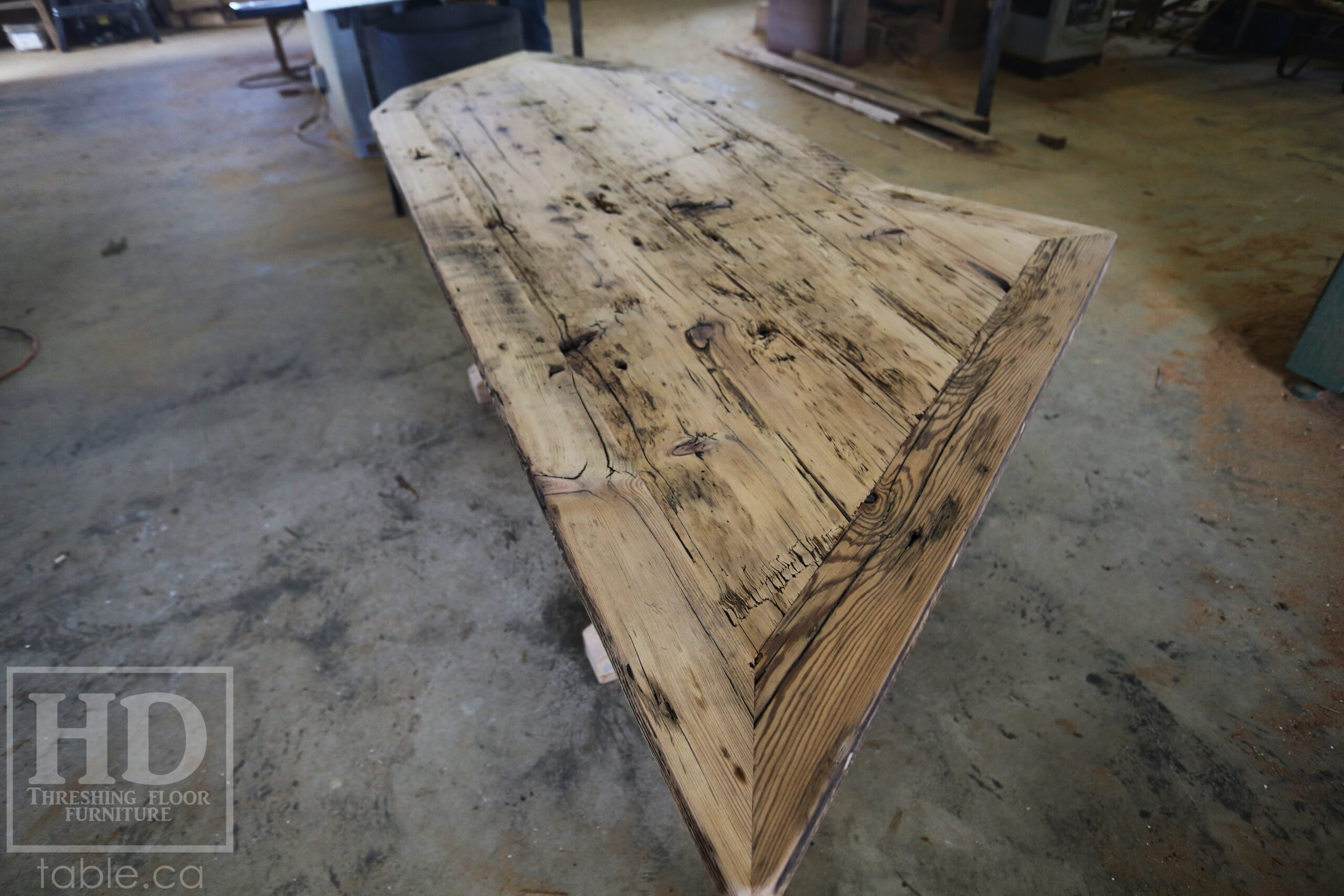 Custom Ontario Barnwood Desk â€“ Barn Beam Posts â€“ Modified Shape to Accommodate a Unique Space - Reclaimed Hemlock Threshing Floor 2â€ Top â€“ Original edges & distressing maintained  â€“ www.table.ca